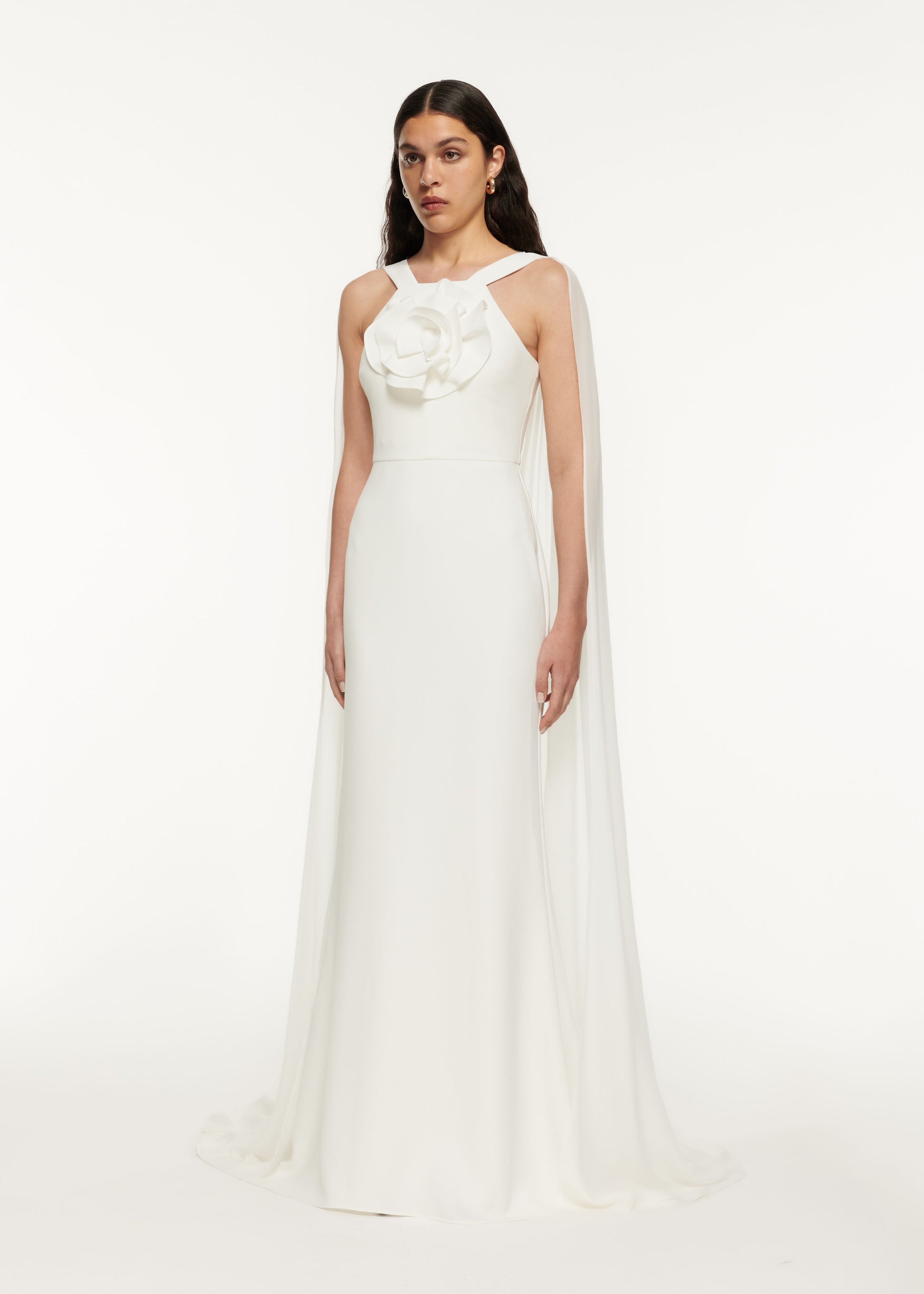 A woman wearing the Stretch Cady Gown White