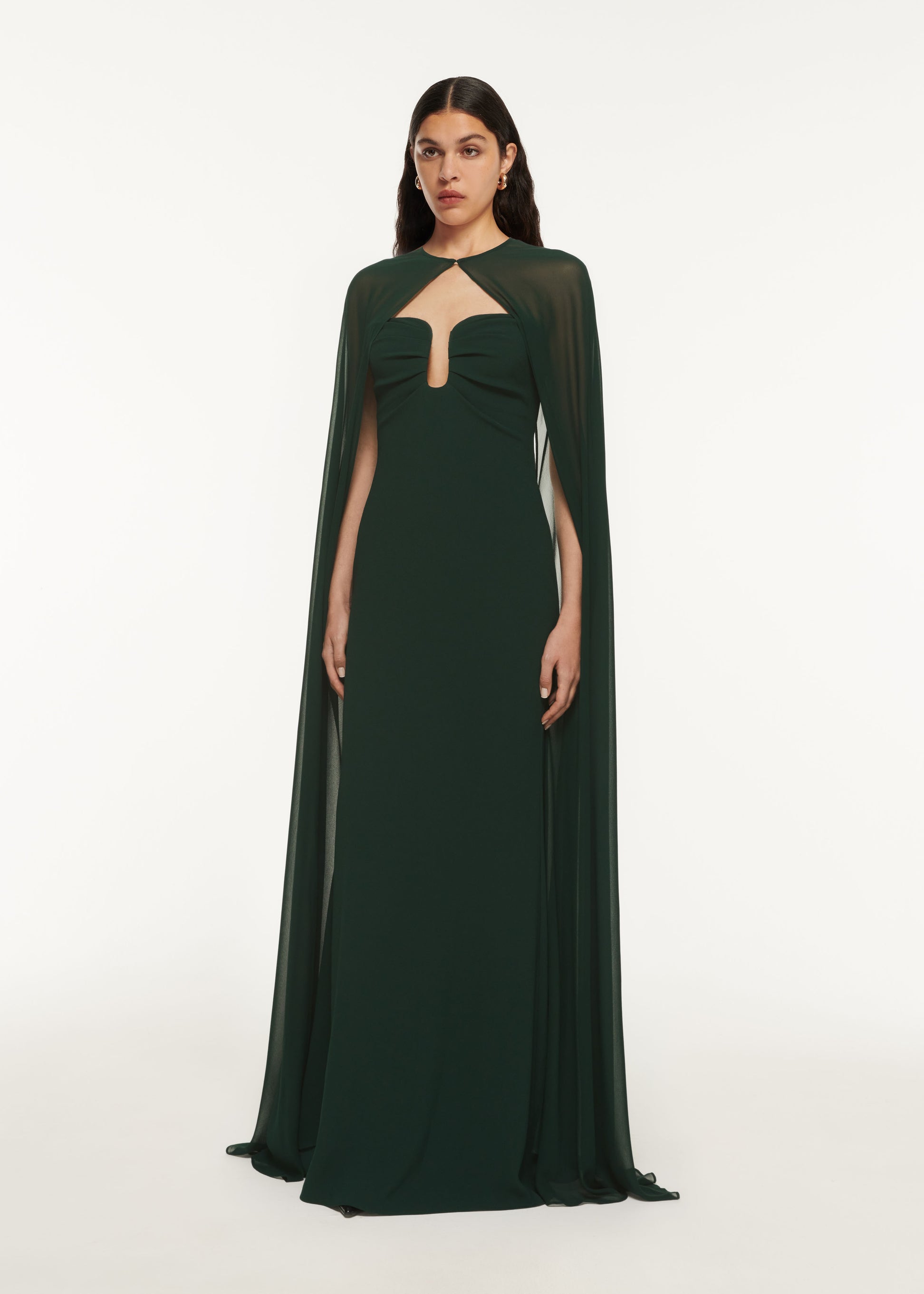 A woman wearing the Strapless Satin Crepe Gown Green