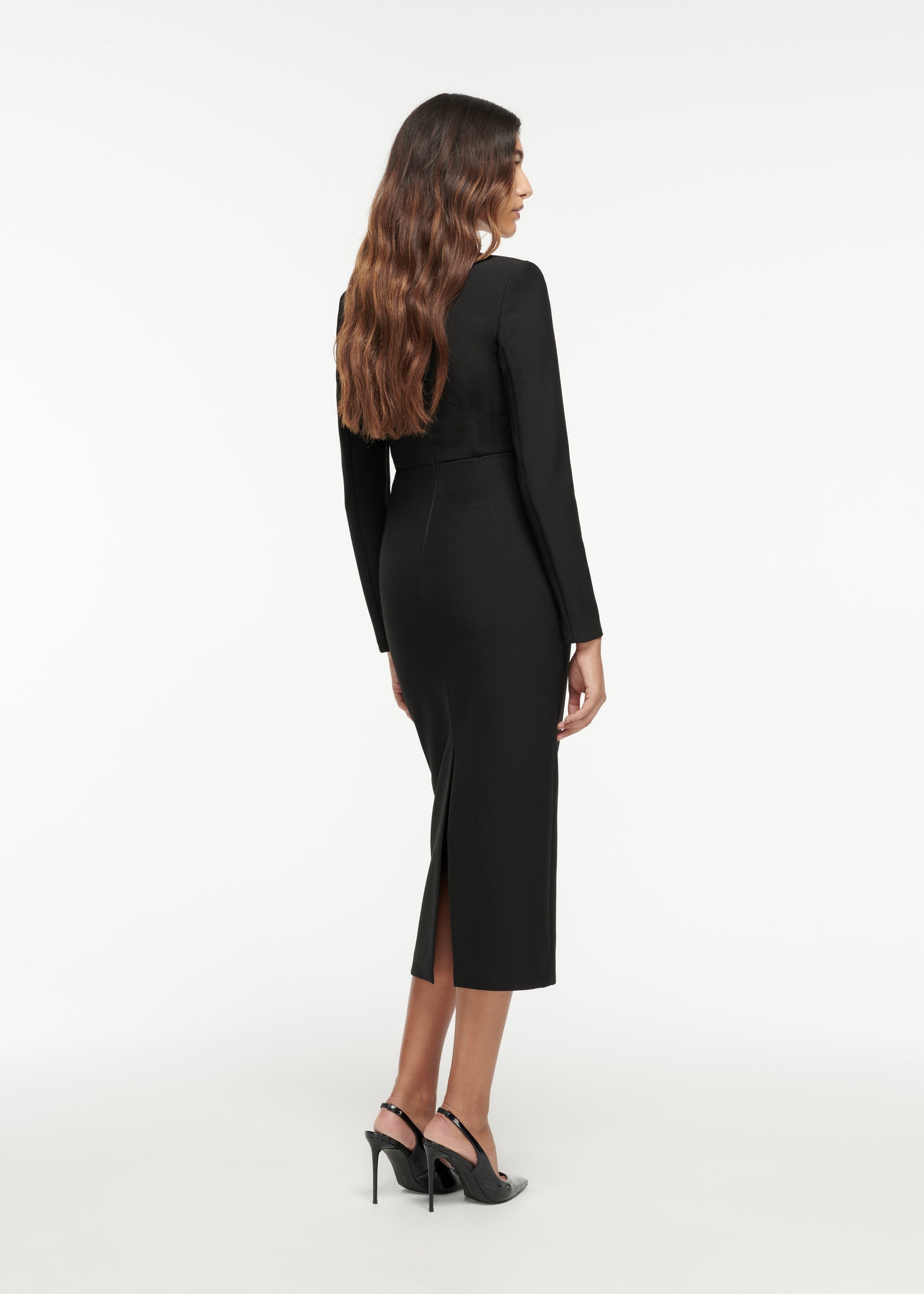 Back view of a model wearing the Long Sleeve Crepe Midi Dress in Monochrome