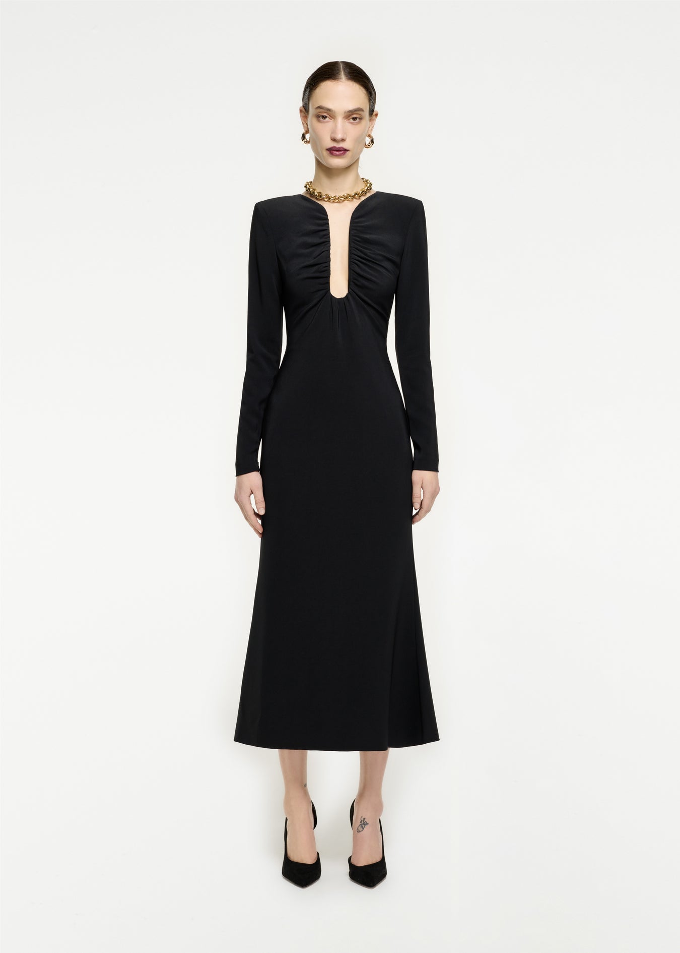 Woman wearing the Long Sleeve Stretch Cady Midi Dress in Black
