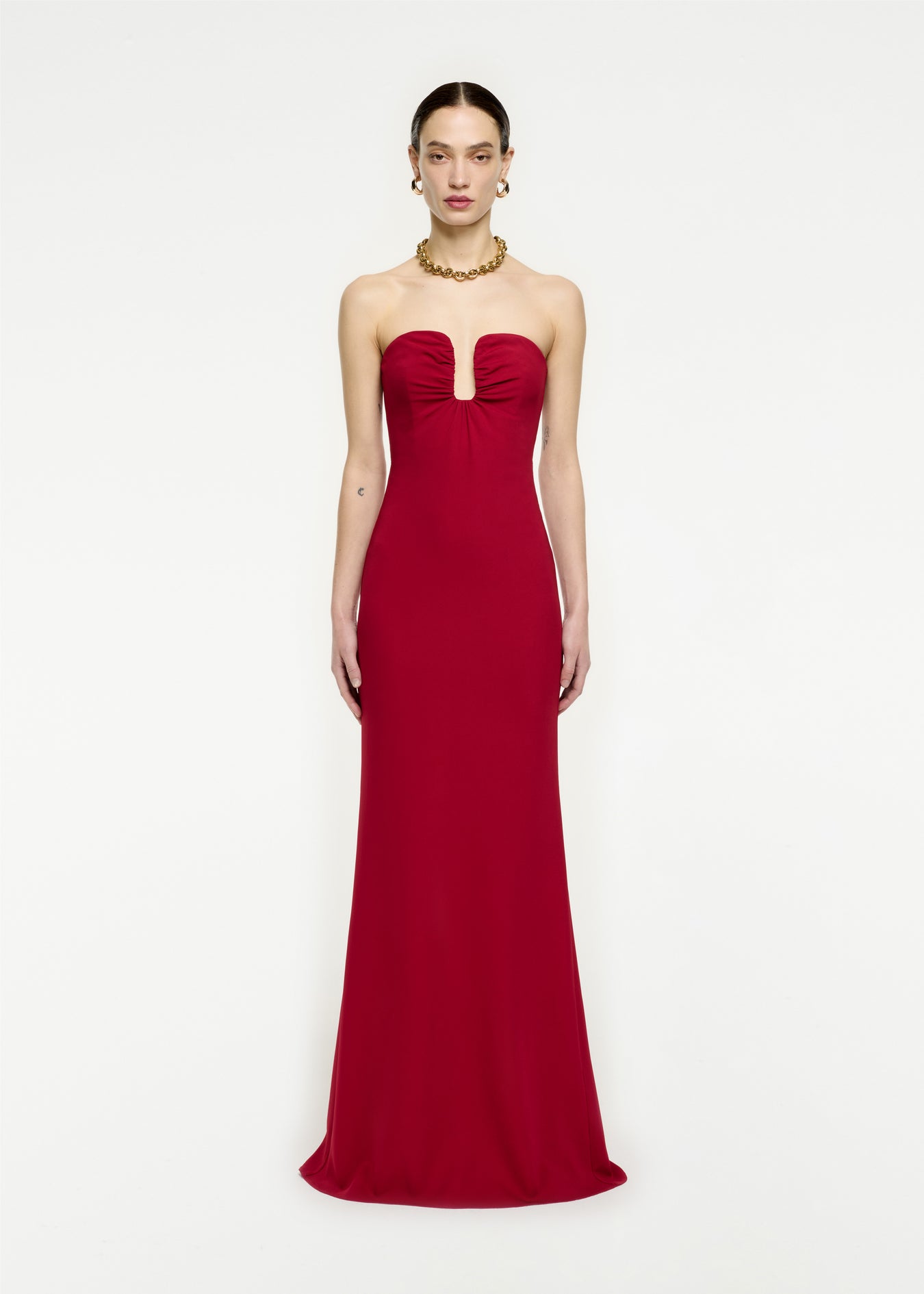 Woman wearing the Strapless Stretch Cady Maxi Dress in Red