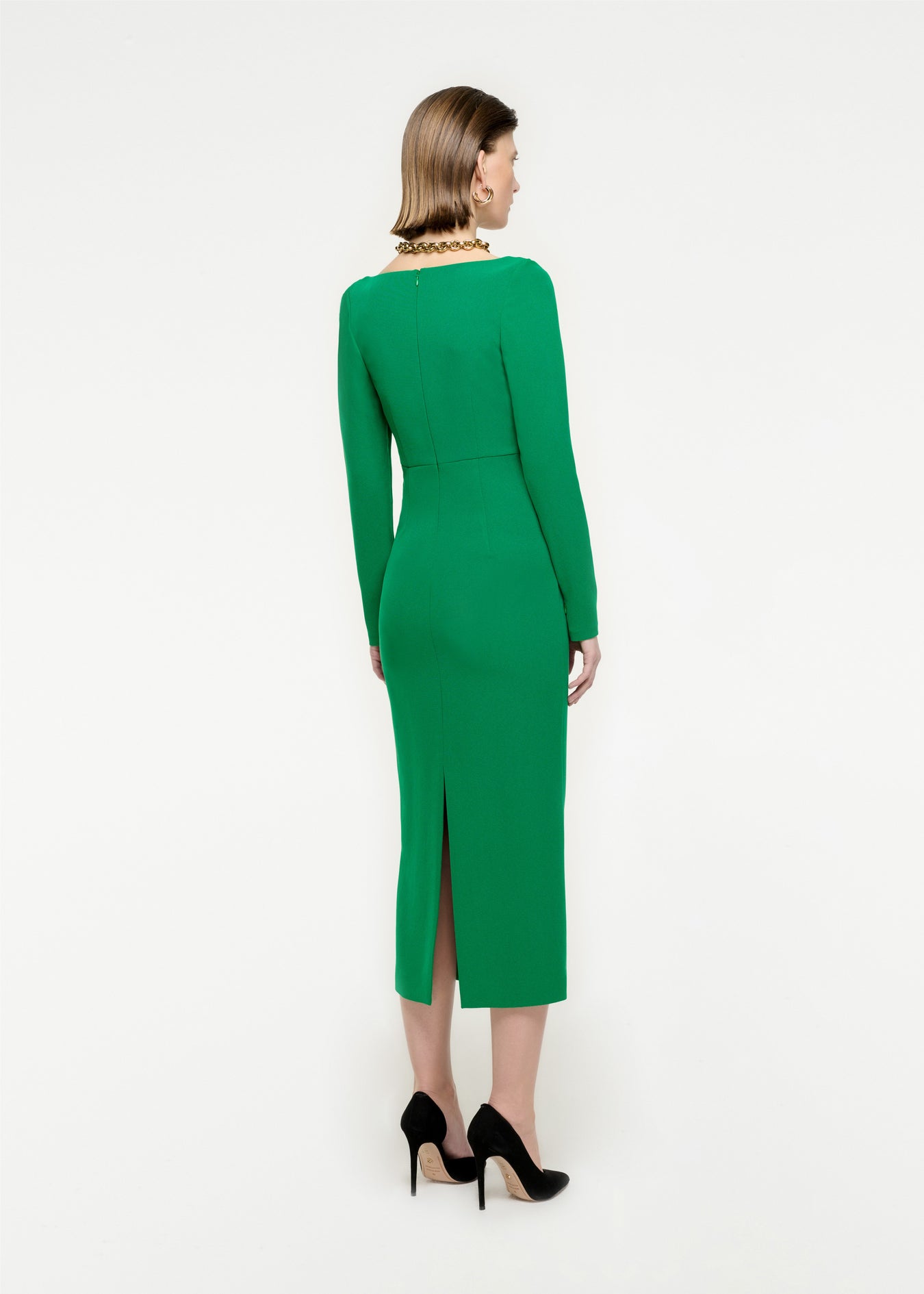 The back of a woman wearing the Long Sleeve Stretch Cady Midi Dress in Green