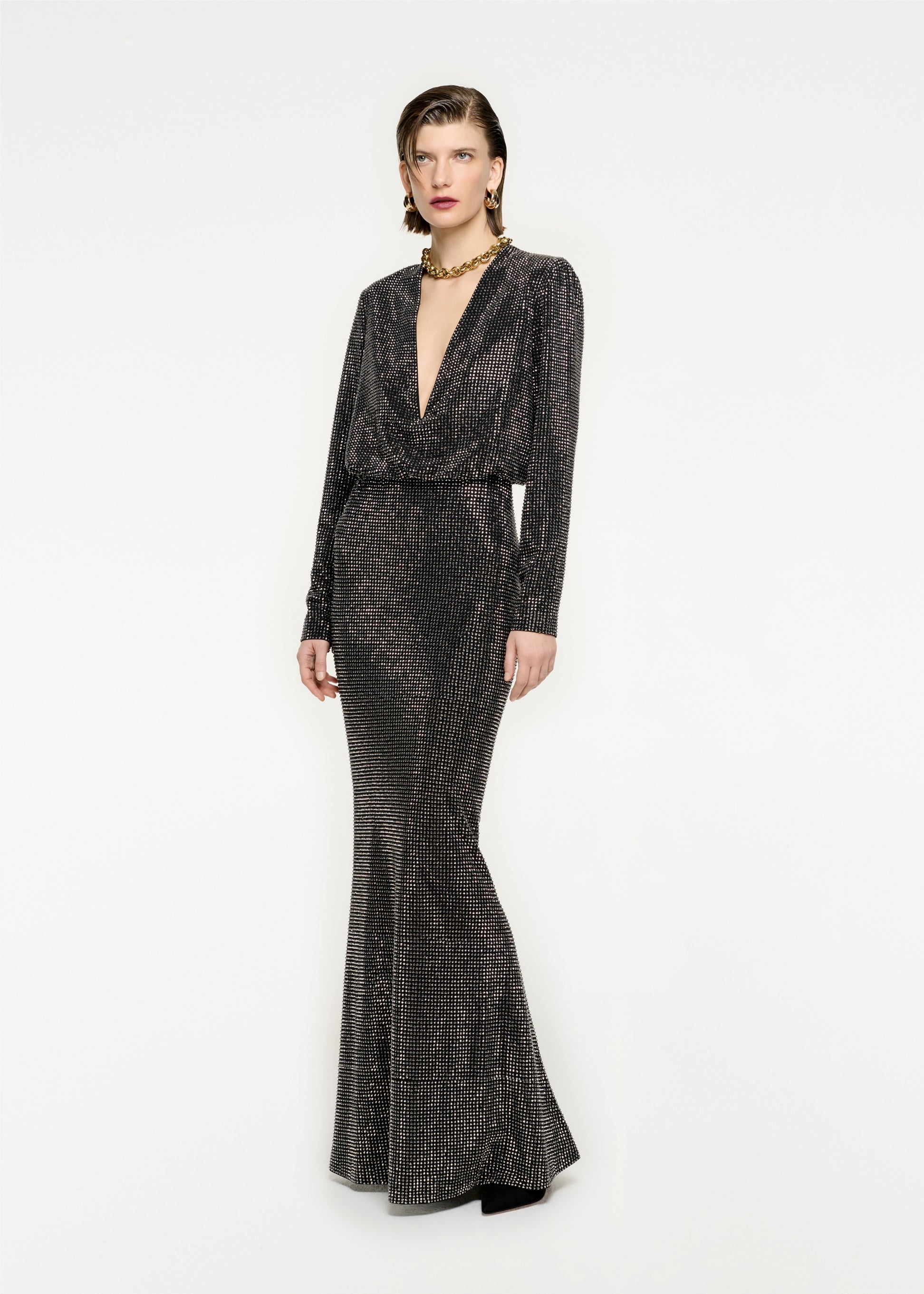 Woman wearing the Long Sleeve Diamante Maxi Dress in Black