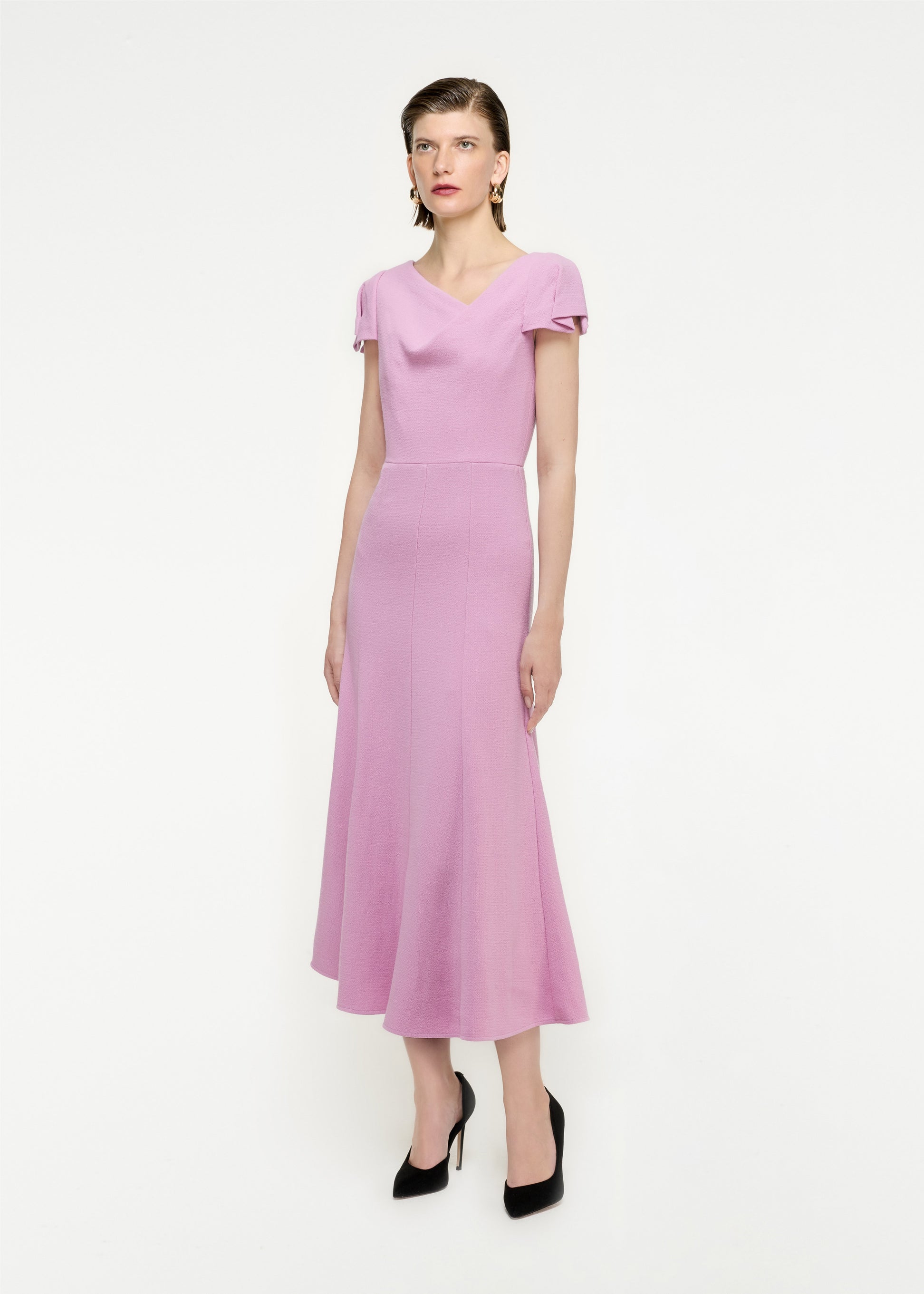 Woman wearing the Cap Sleeve Wool Crepe Midi Dress in Pink
