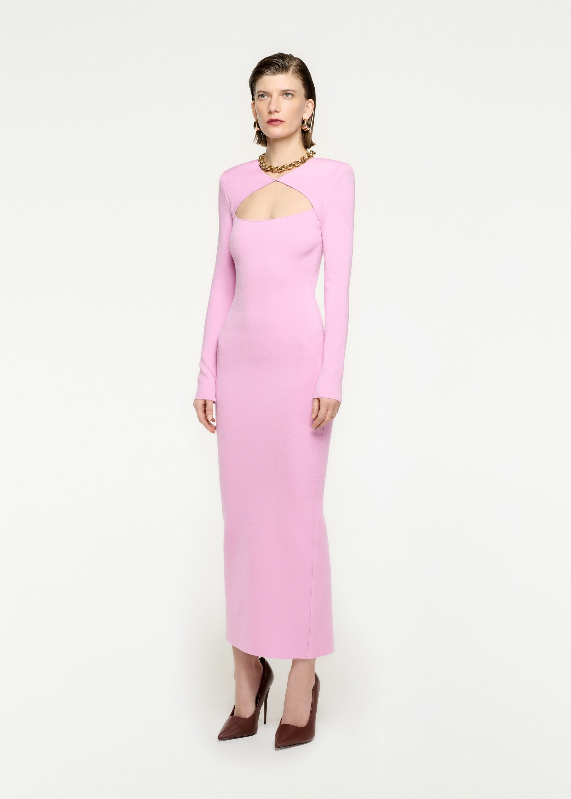 Woman wearing the Long Sleeve Knit Midi Dress in Pink