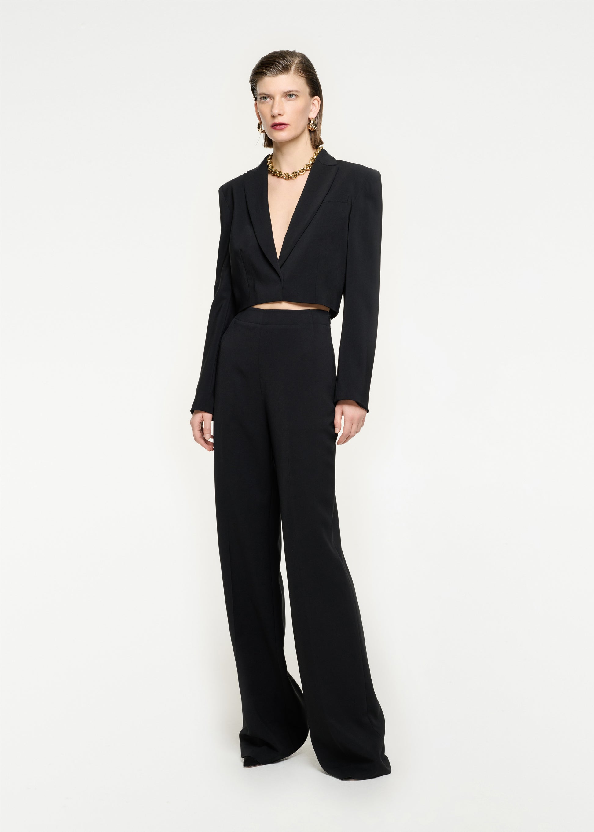 Woman wearing the Wide Leg Stretch Cady Trouser in Black