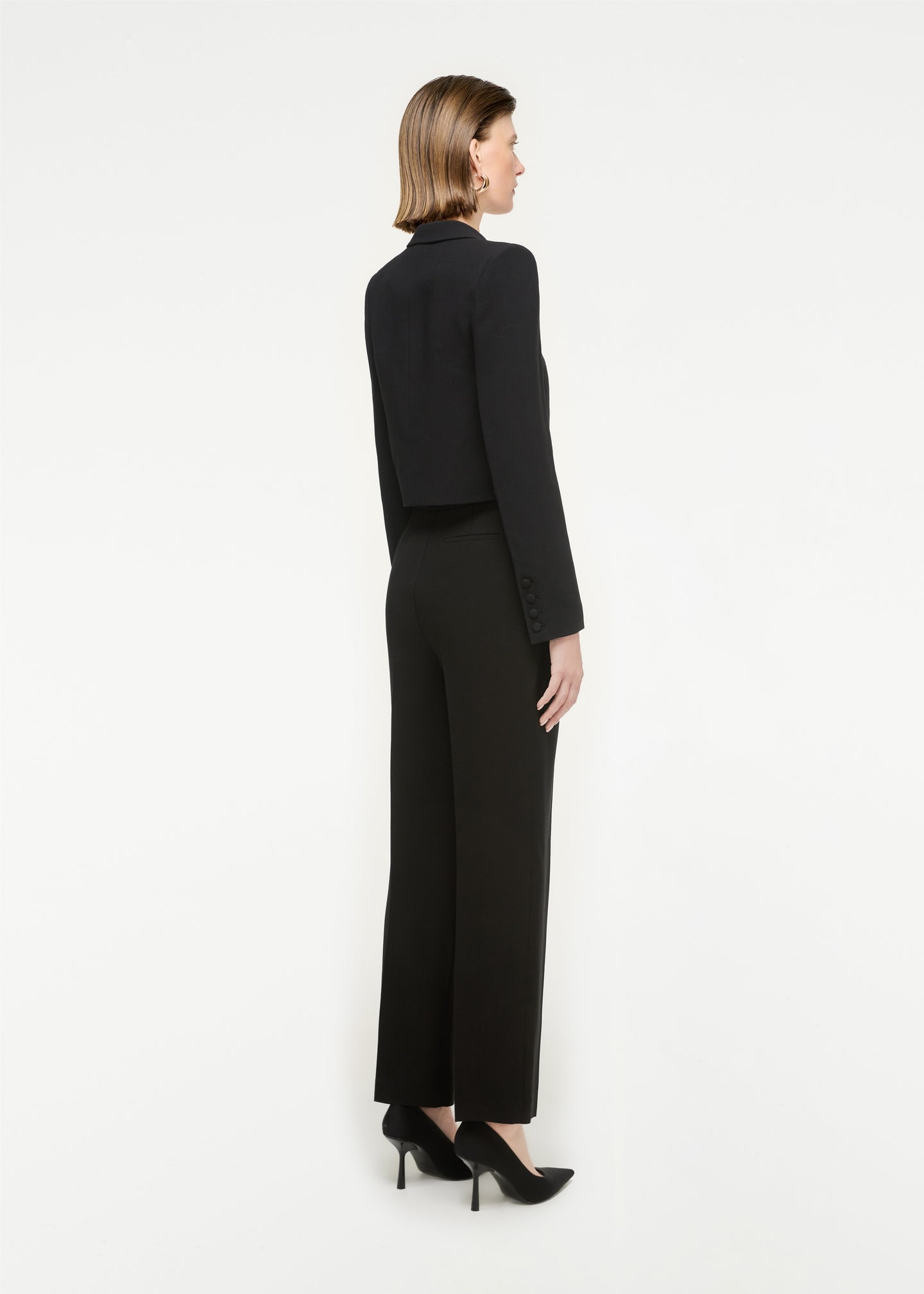 The back of a woman wearing the Straight Cut Wool Silk Trouser in Black