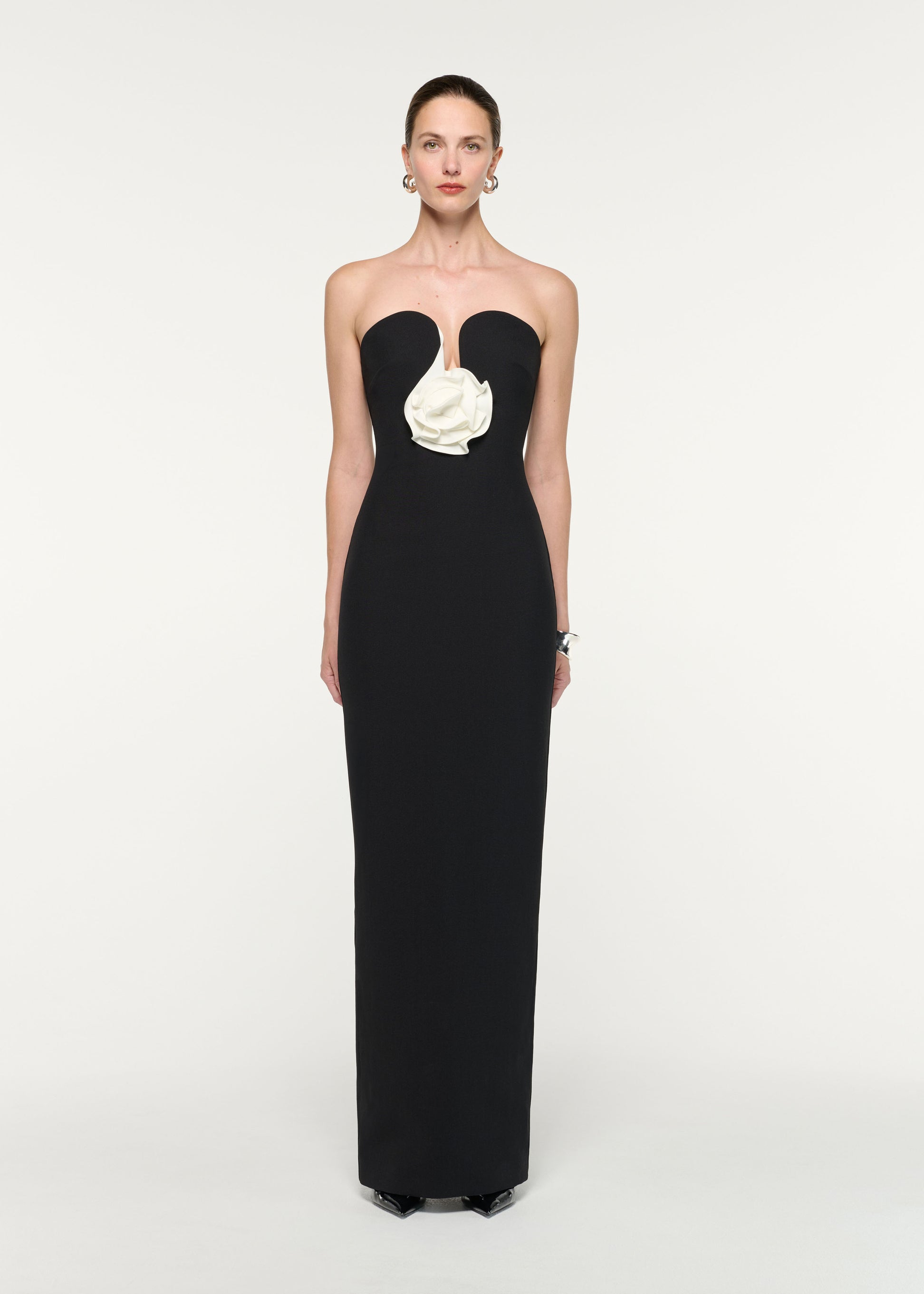 Front view of a model wearing the Strapless Monochrome Flower Gown