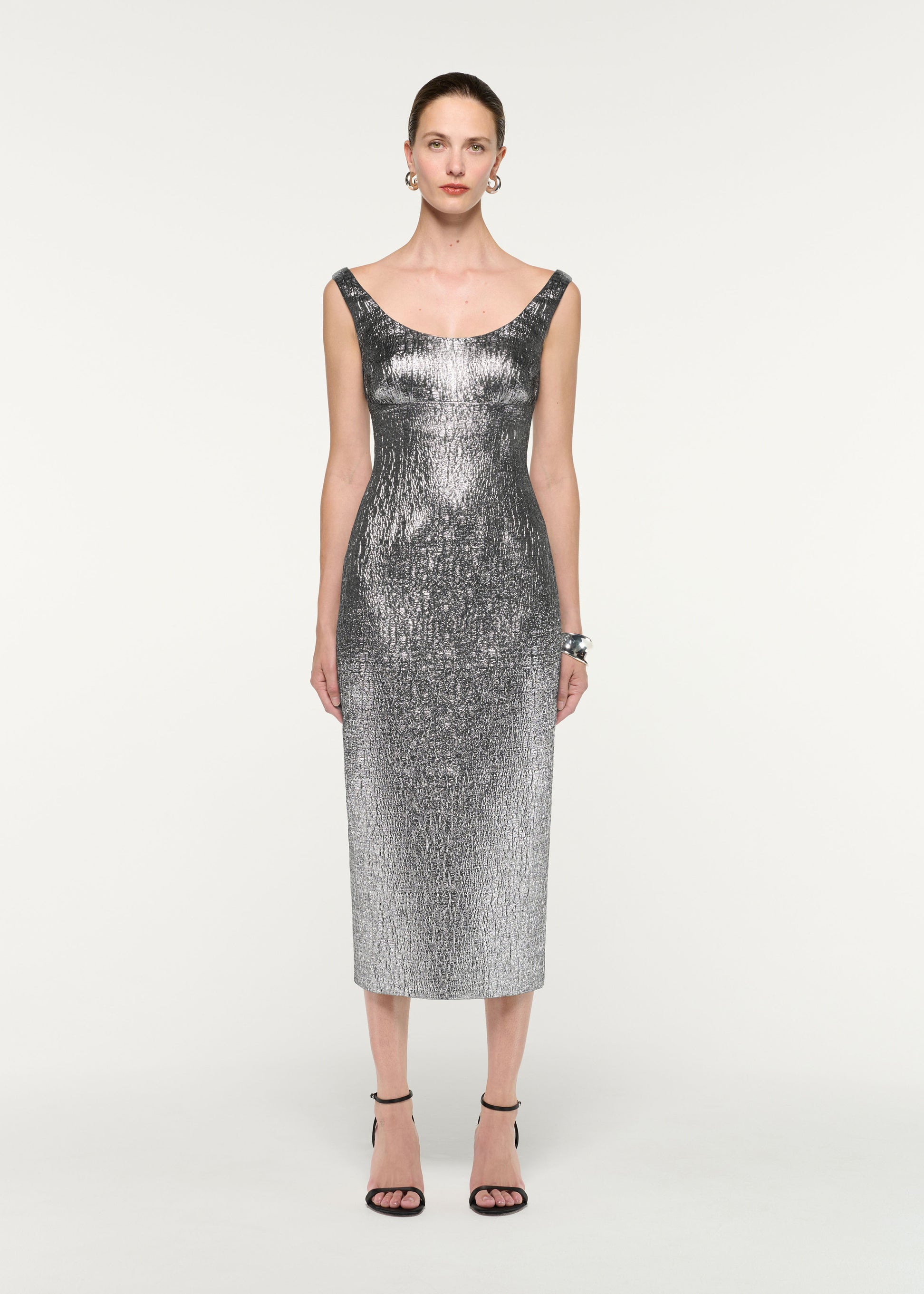 Front view of a model wearing the Metallic Jaquard Column Midi Dress