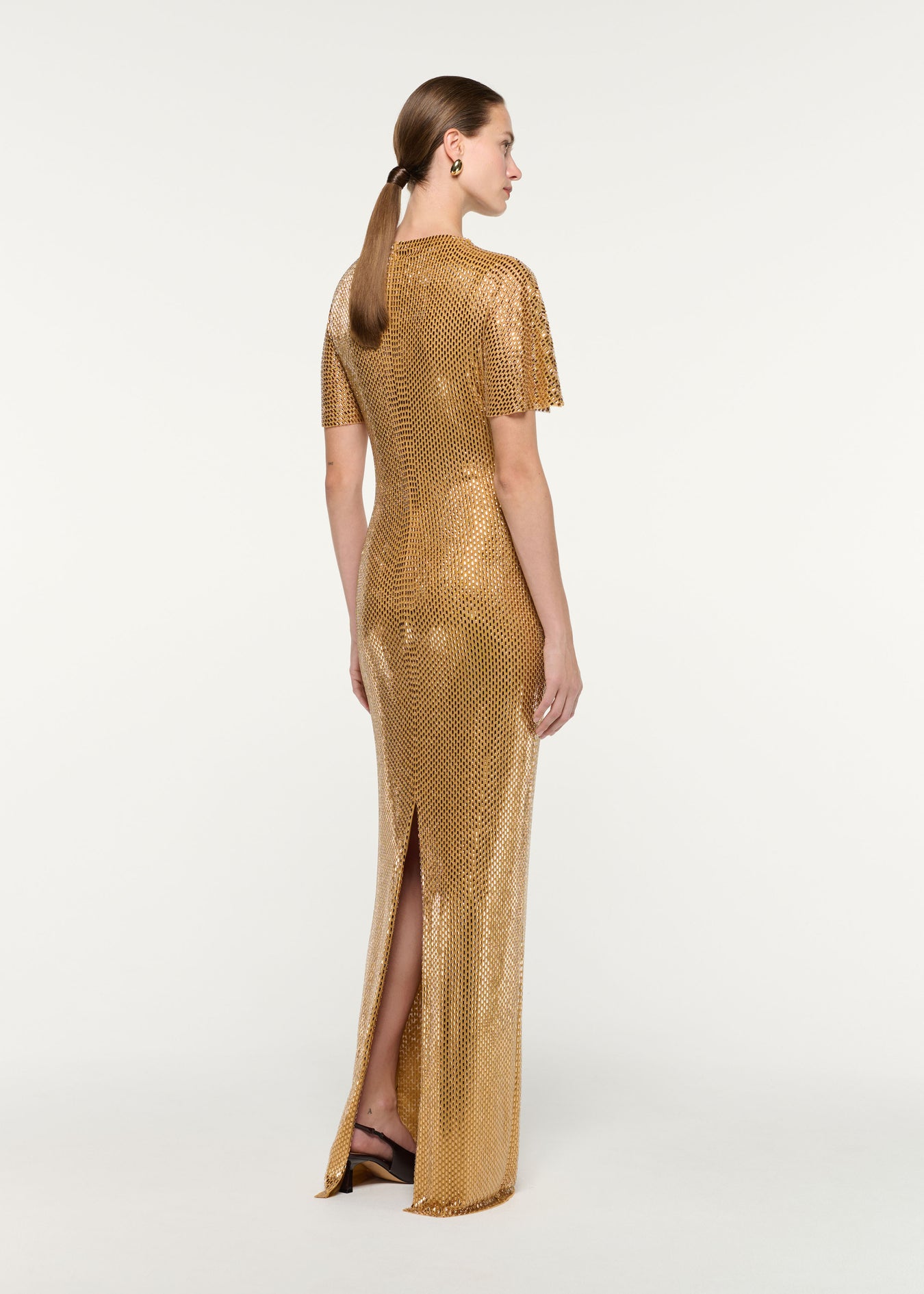 Back view of a model wearing the High Neck Diamante Short Sleeve Gown