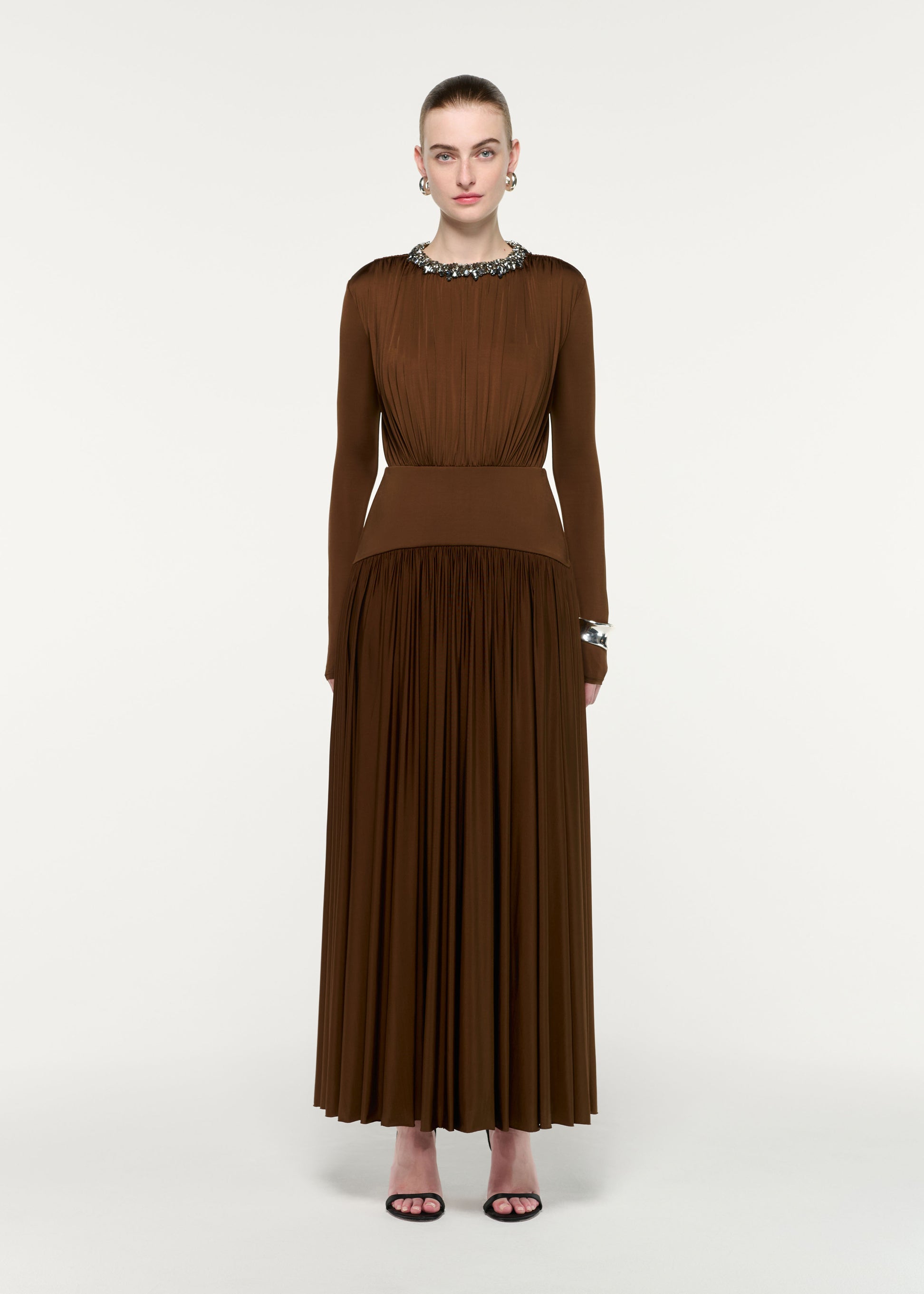 Front view of a model wearing the Embellished Neck Long Sleeve Gathered Dress