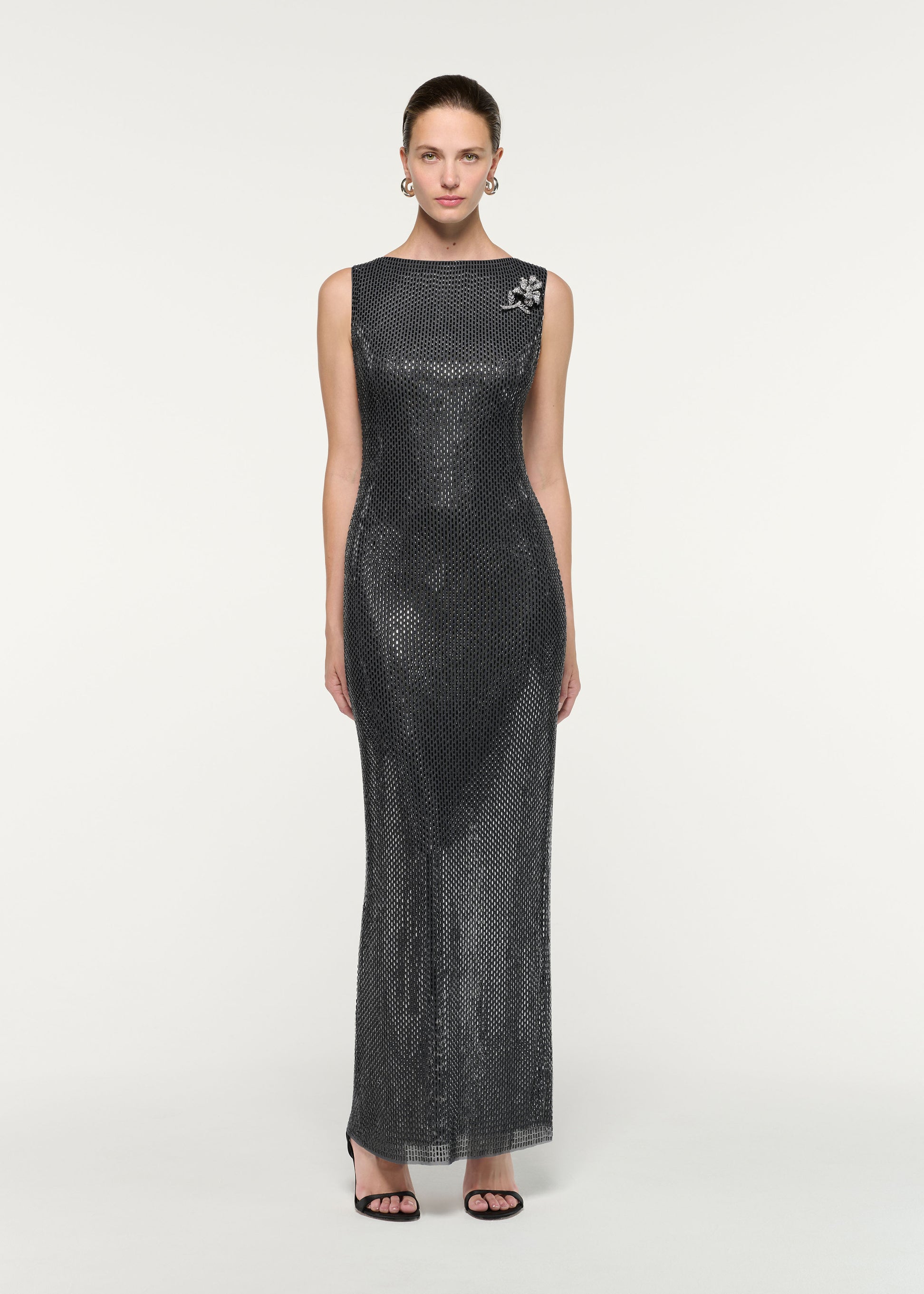 Front view of a model wearing the Flower Brooch Diamante Maxi Dress