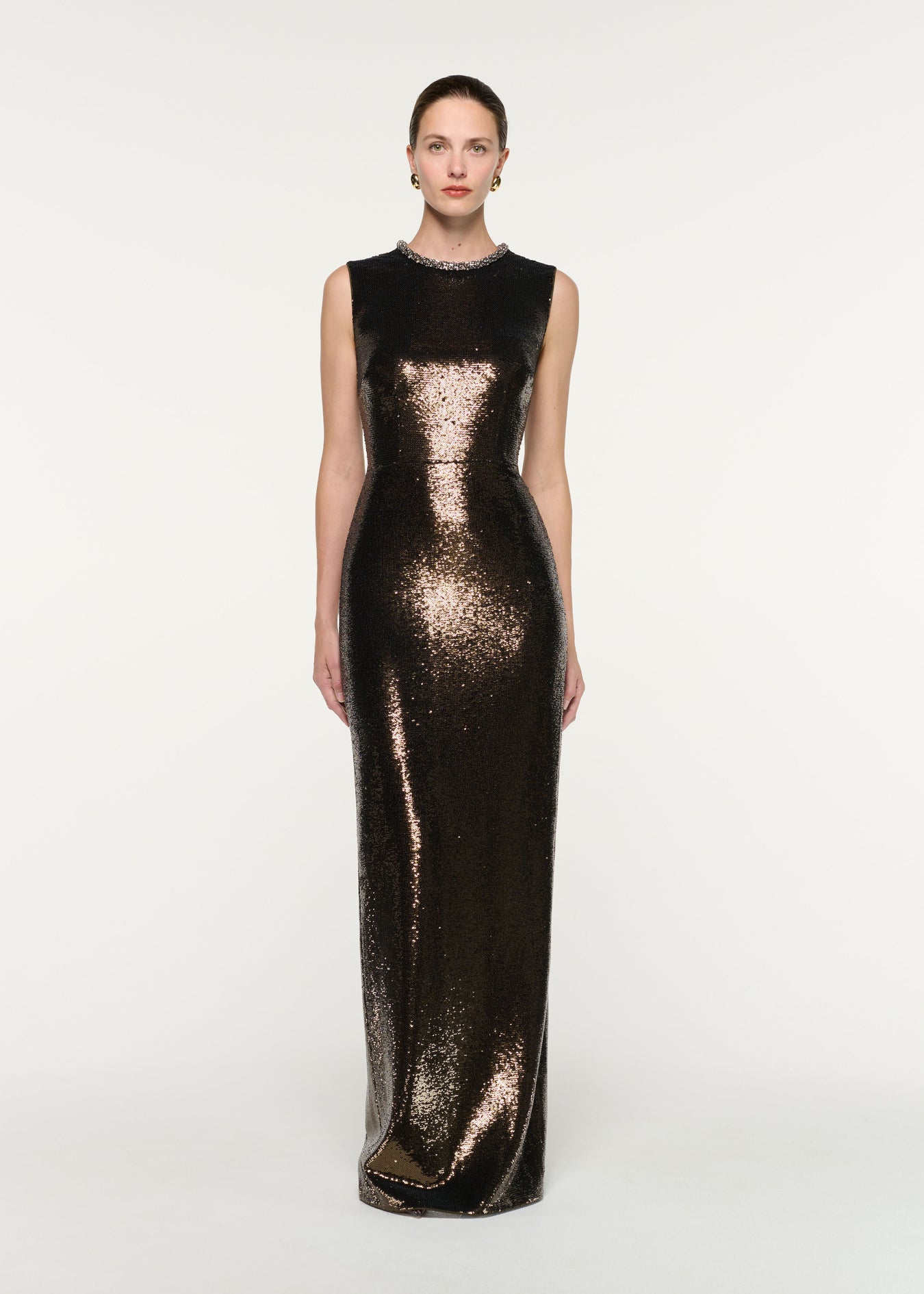Front view of a model wearing the Embellished Neck Sequin Gown