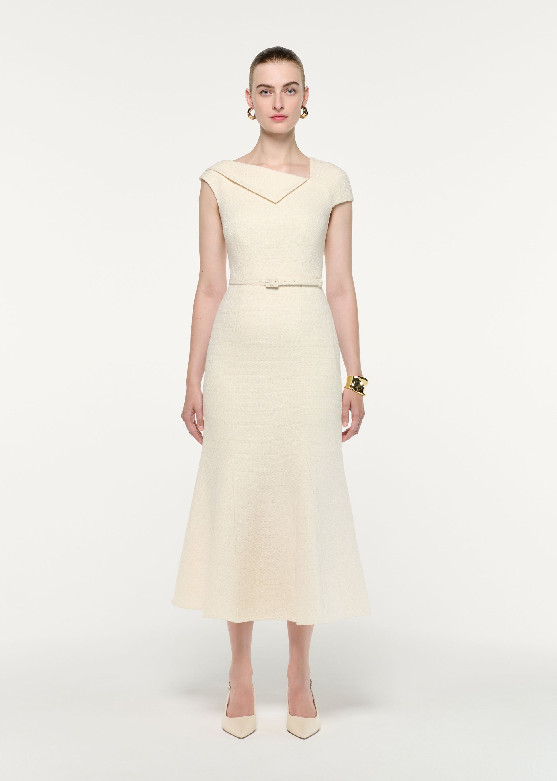 Front view of a model wearing the Asymmetric Neckline Boucle Midi Dress
