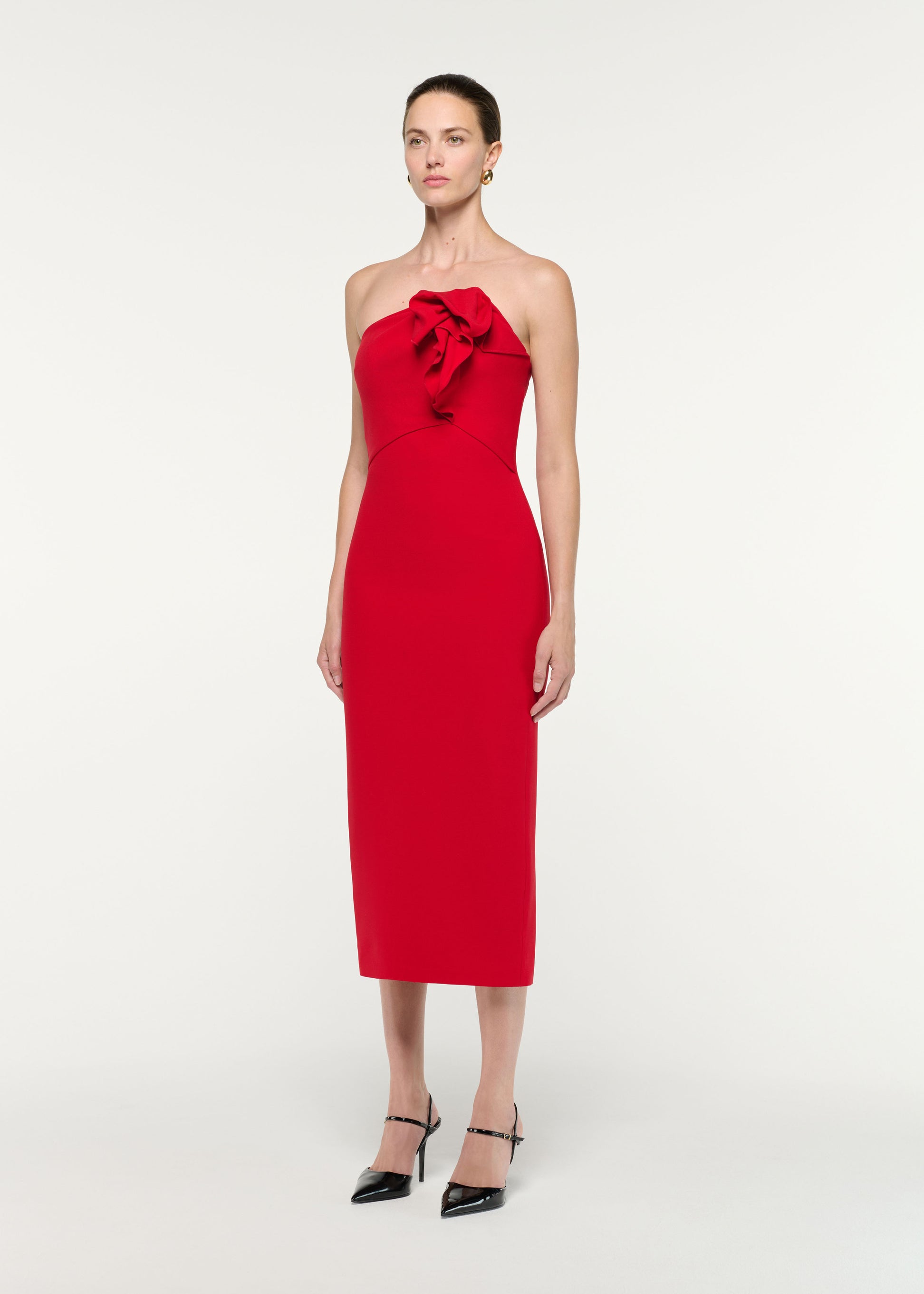 Side view of a model wearing the Strapless Wool Silk Midi Dress