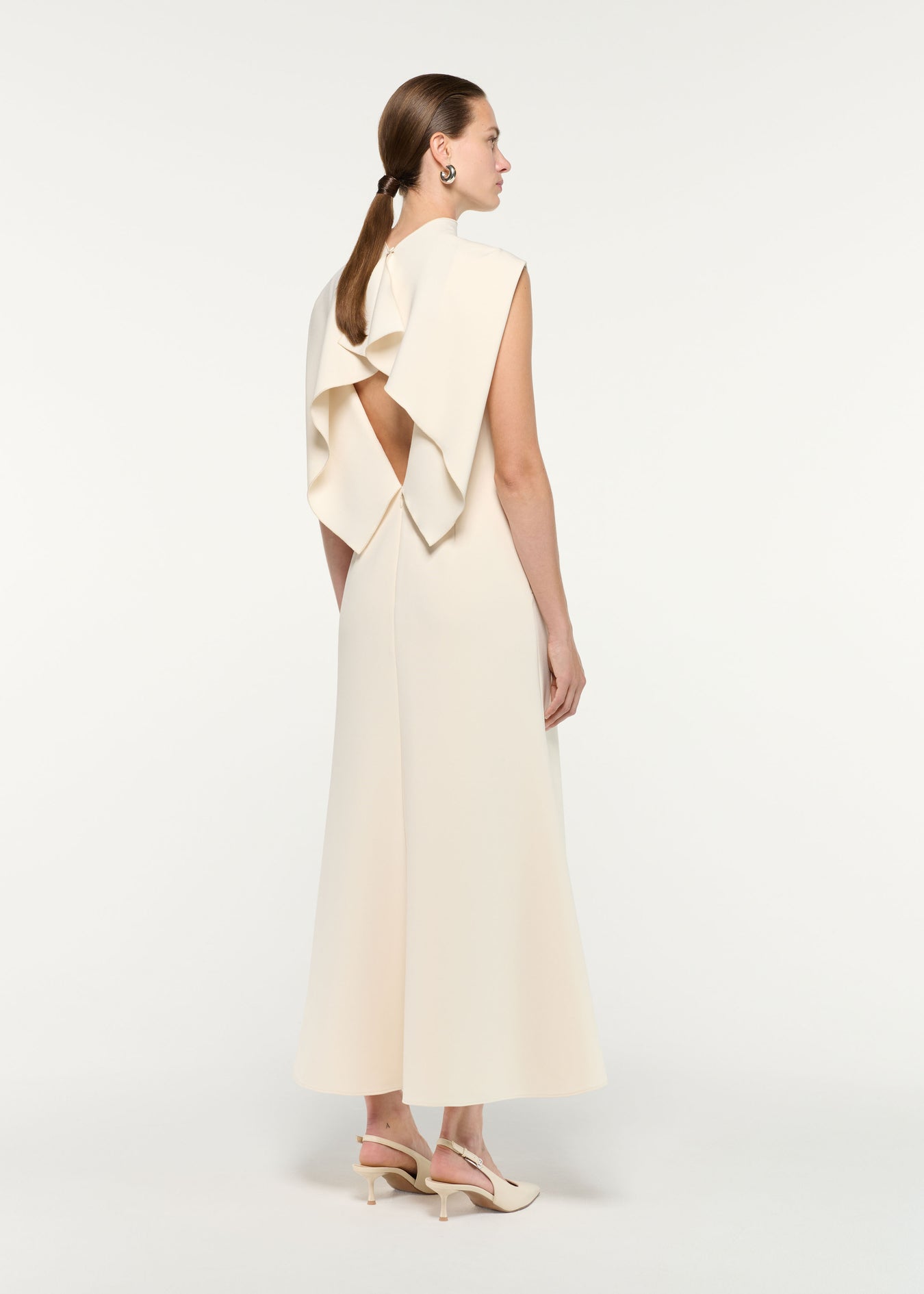 Back view of a model wearing the Flower Embroidery Crepe Midi Dress