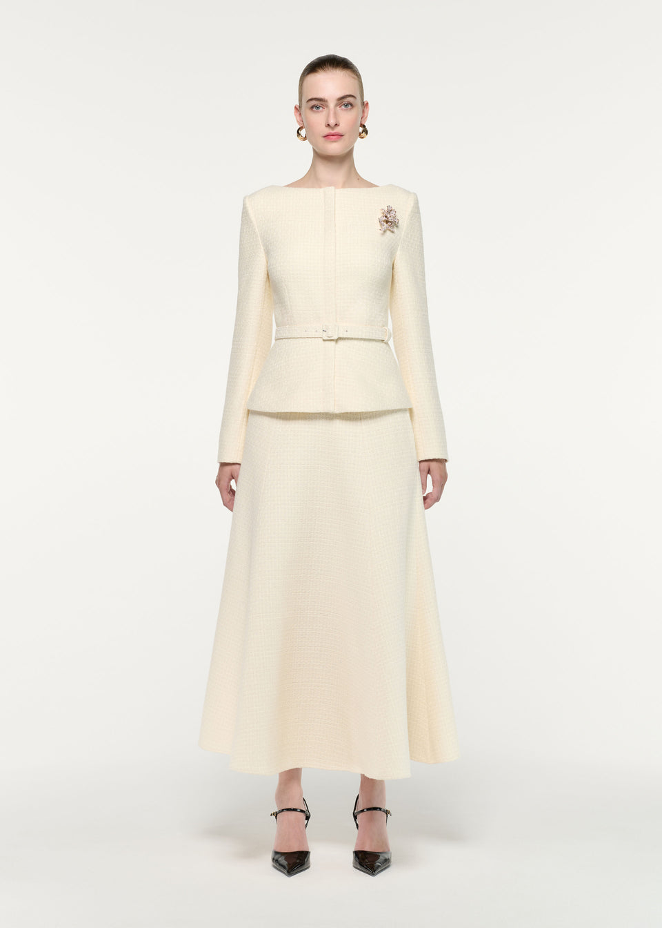 Front view of a model wearing the Boucle Midi Flared Skirt