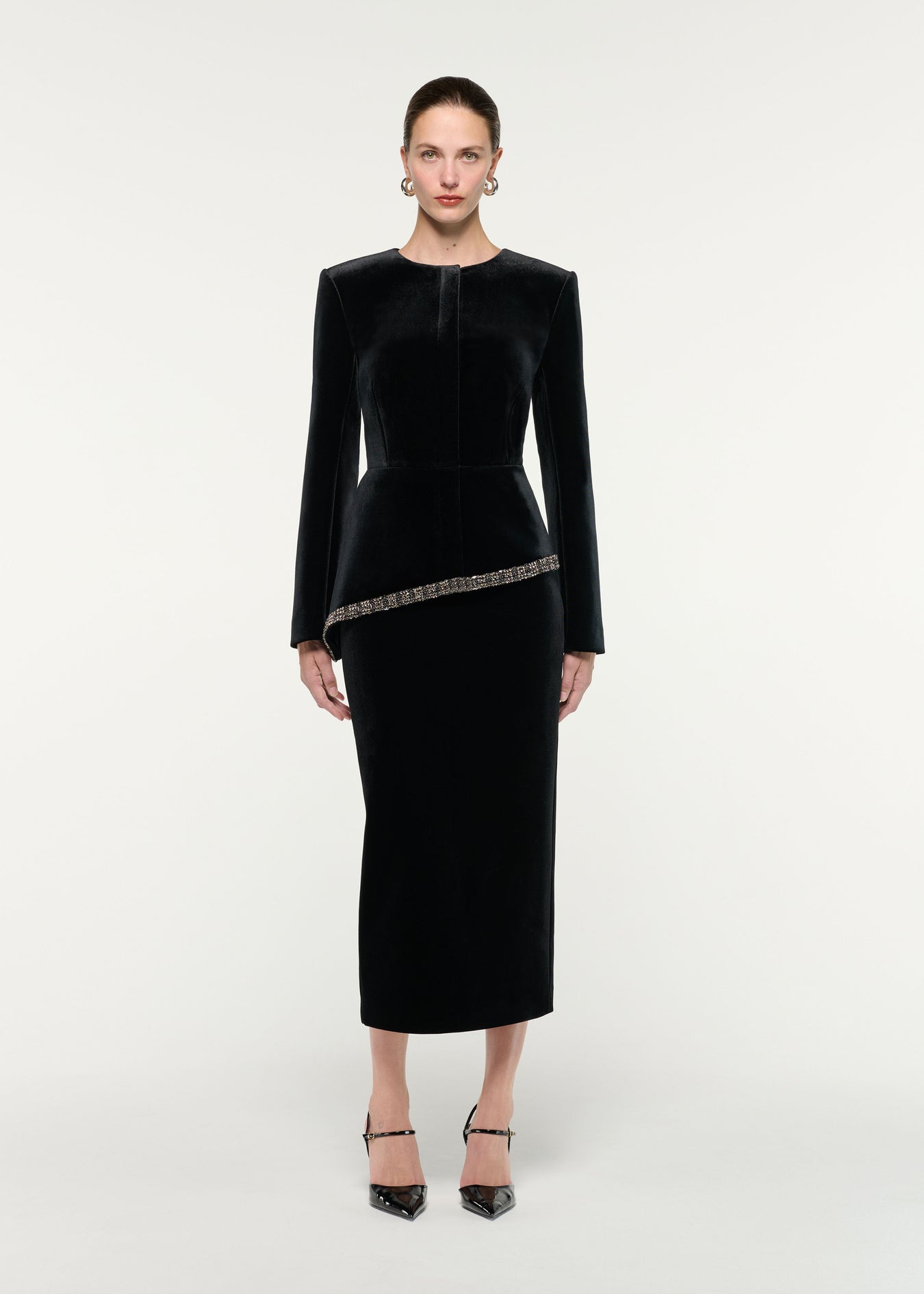 Front view of a model wearing the Velvet Embellished Trim Peplum Jacket