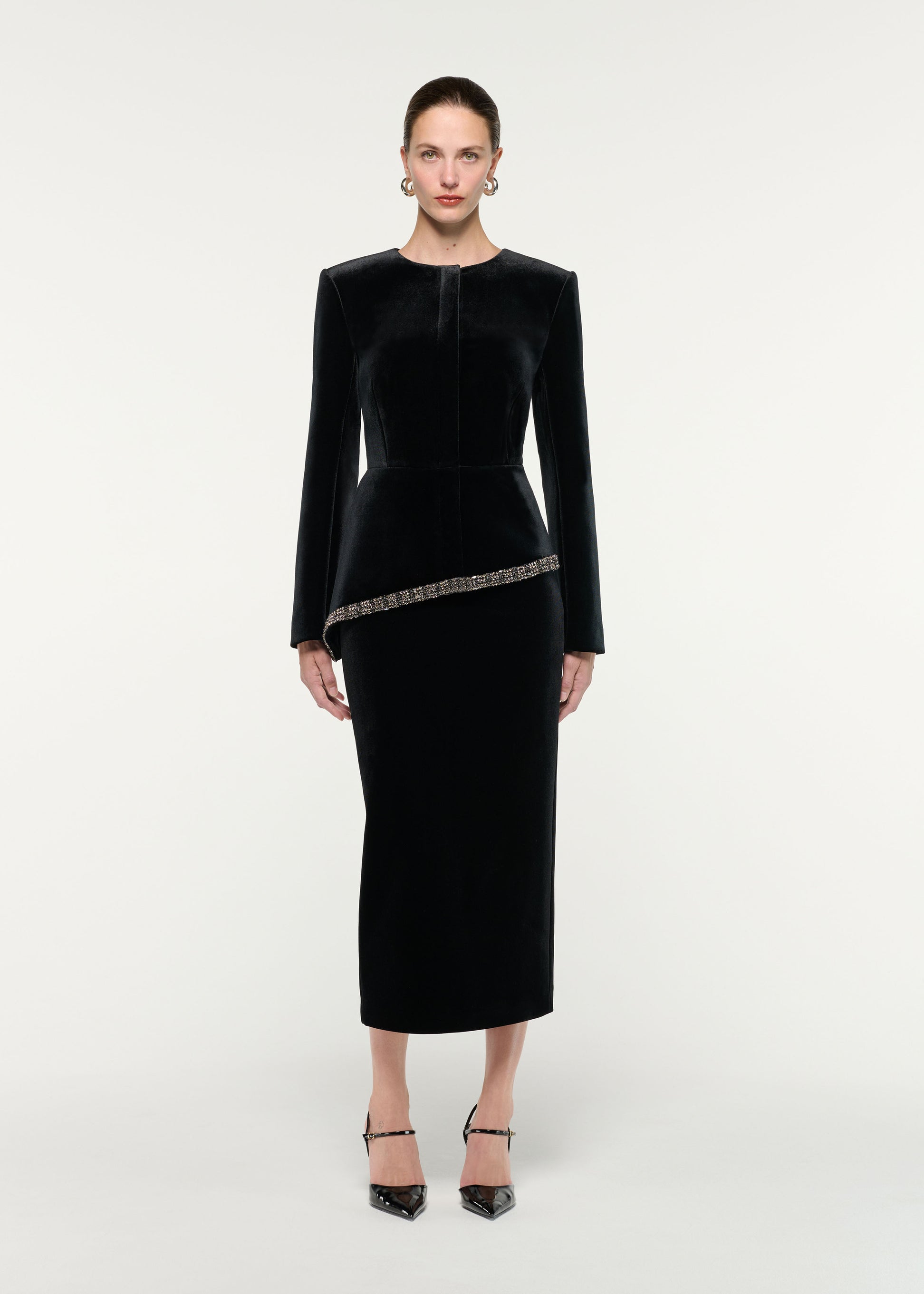 Front view of a model wearing the Velvet Midi Skirt