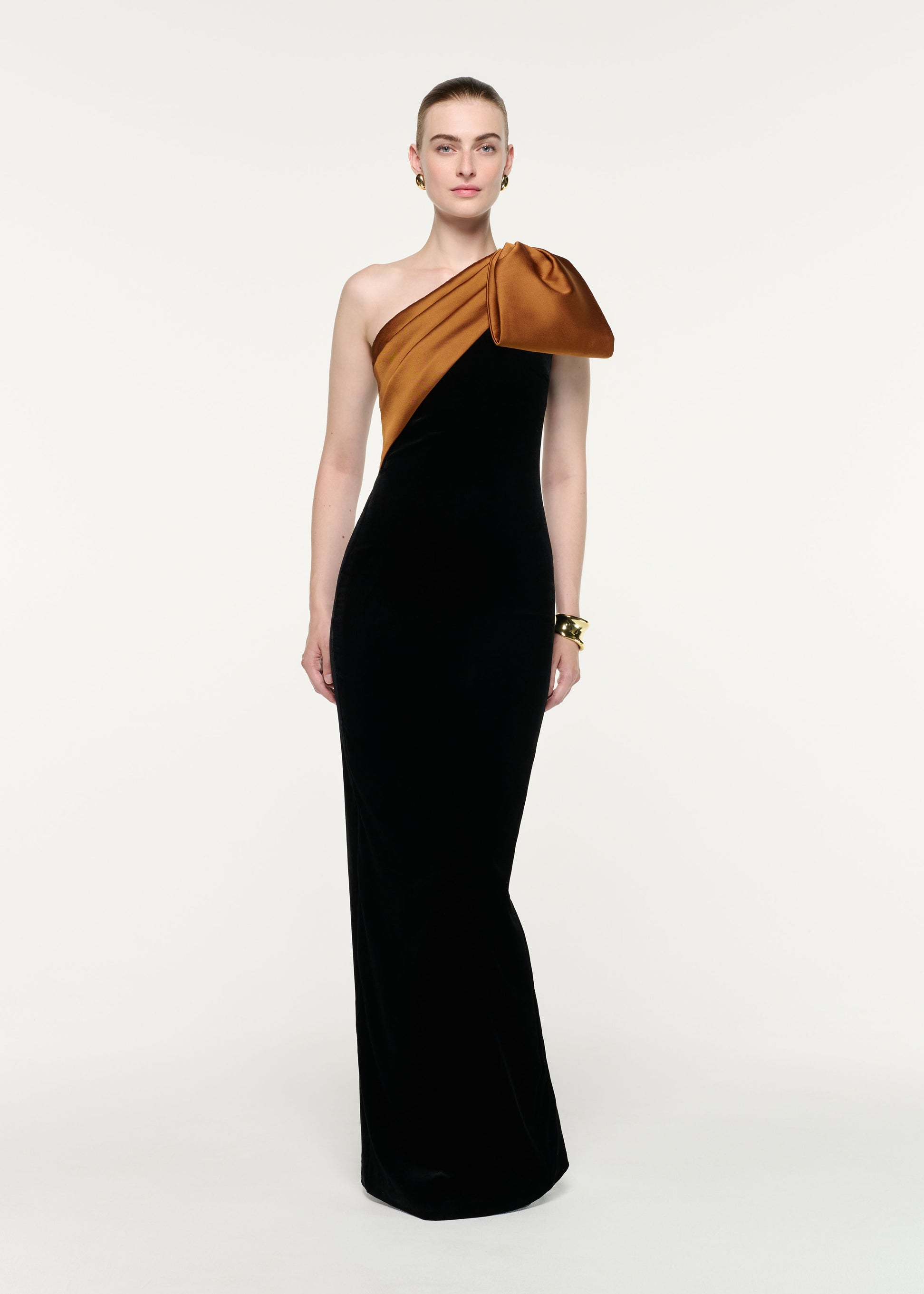 Front view of a model wearing the Satin Bow One Shoulder Velvet Gown
