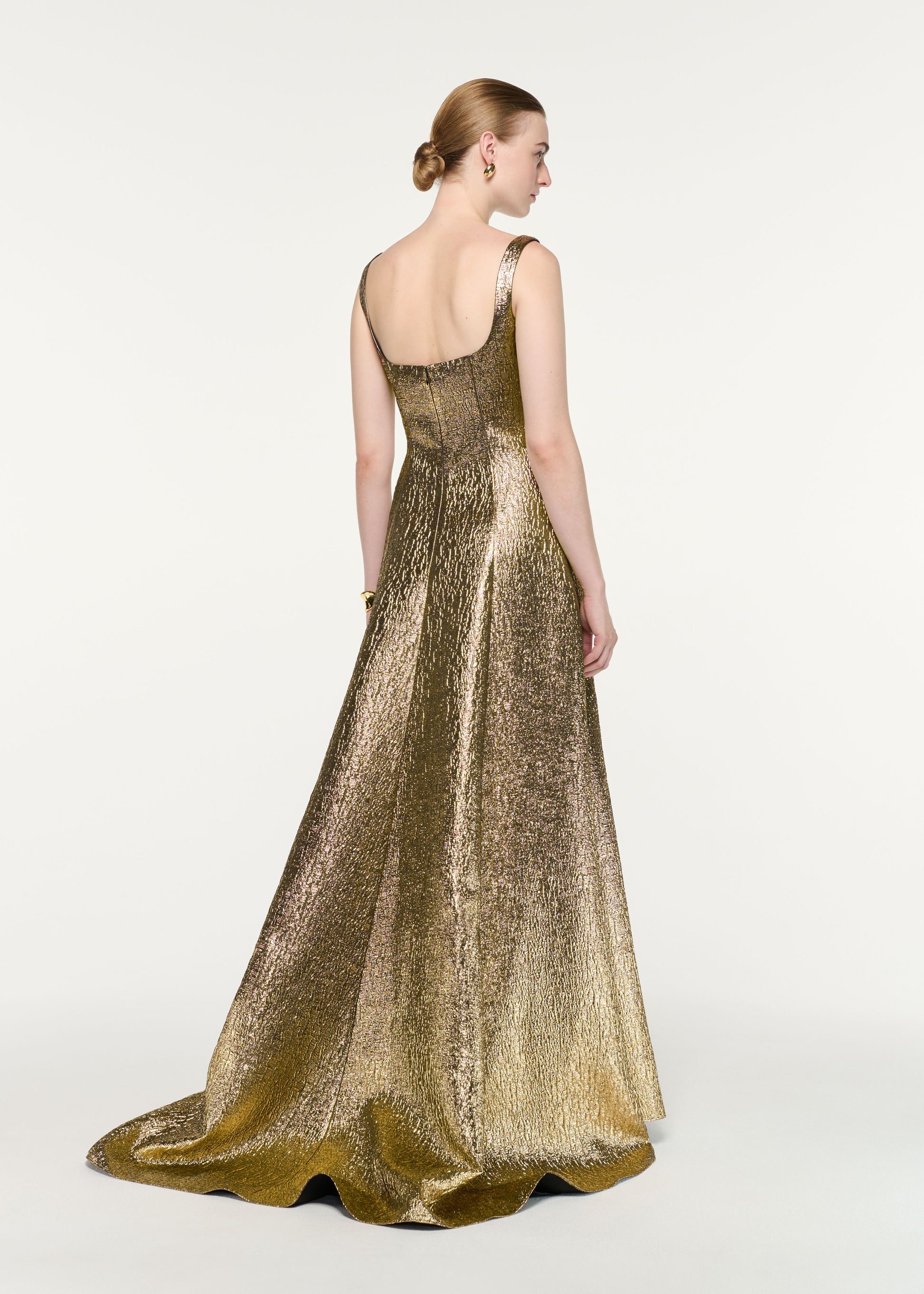 Back view of a model wearing the Metallic Jacquard Square Neck Gown