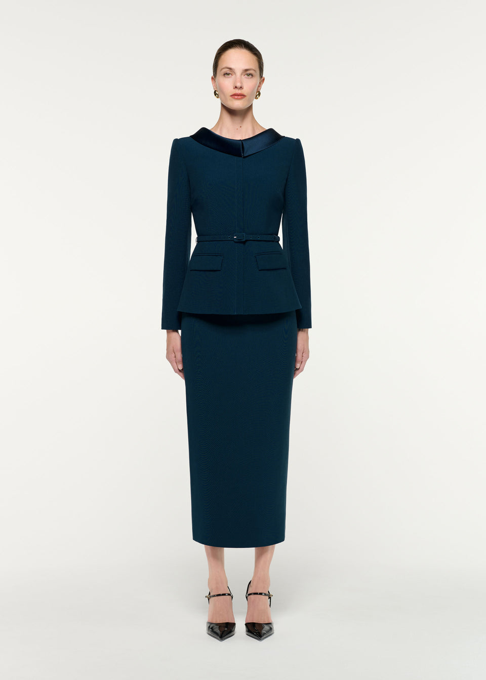 Front view of a model wearing the Crepe Midi Skirt