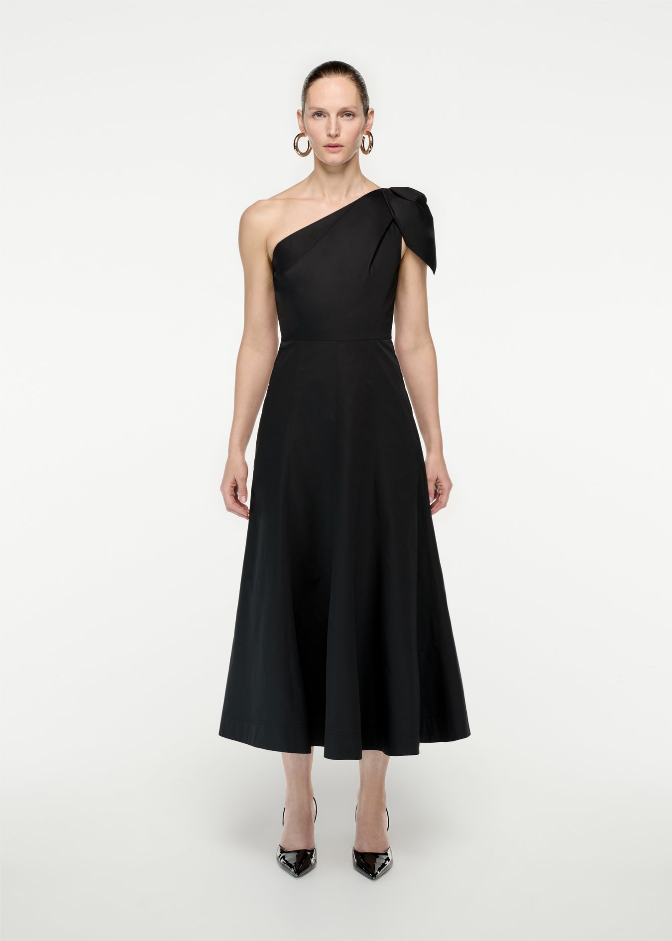 Woman wearing the Asymmetric Cotton Poplin Midi Dress in Black