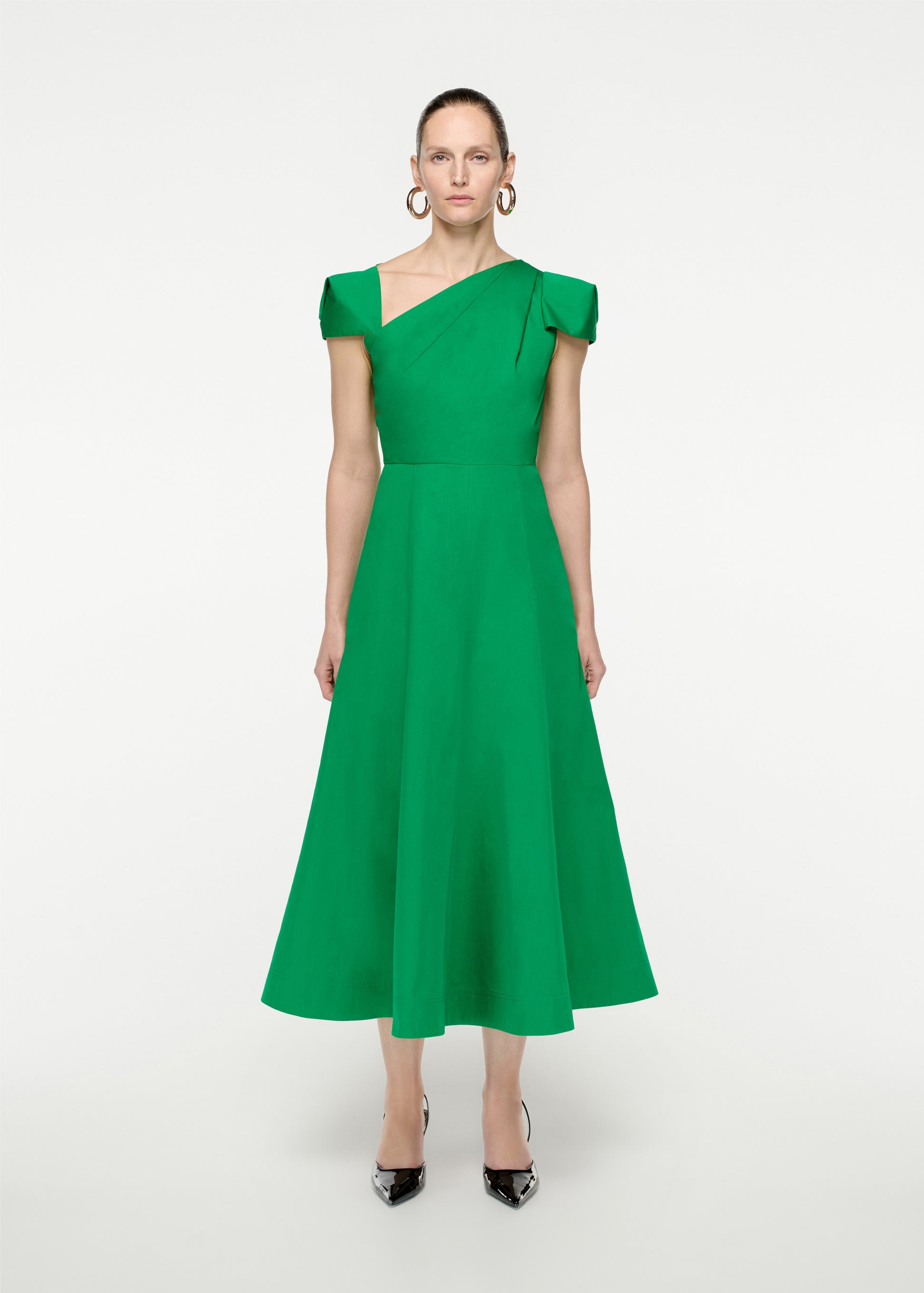Woman wearing the Cap Sleeve Cotton Poplin Midi Dress in Green