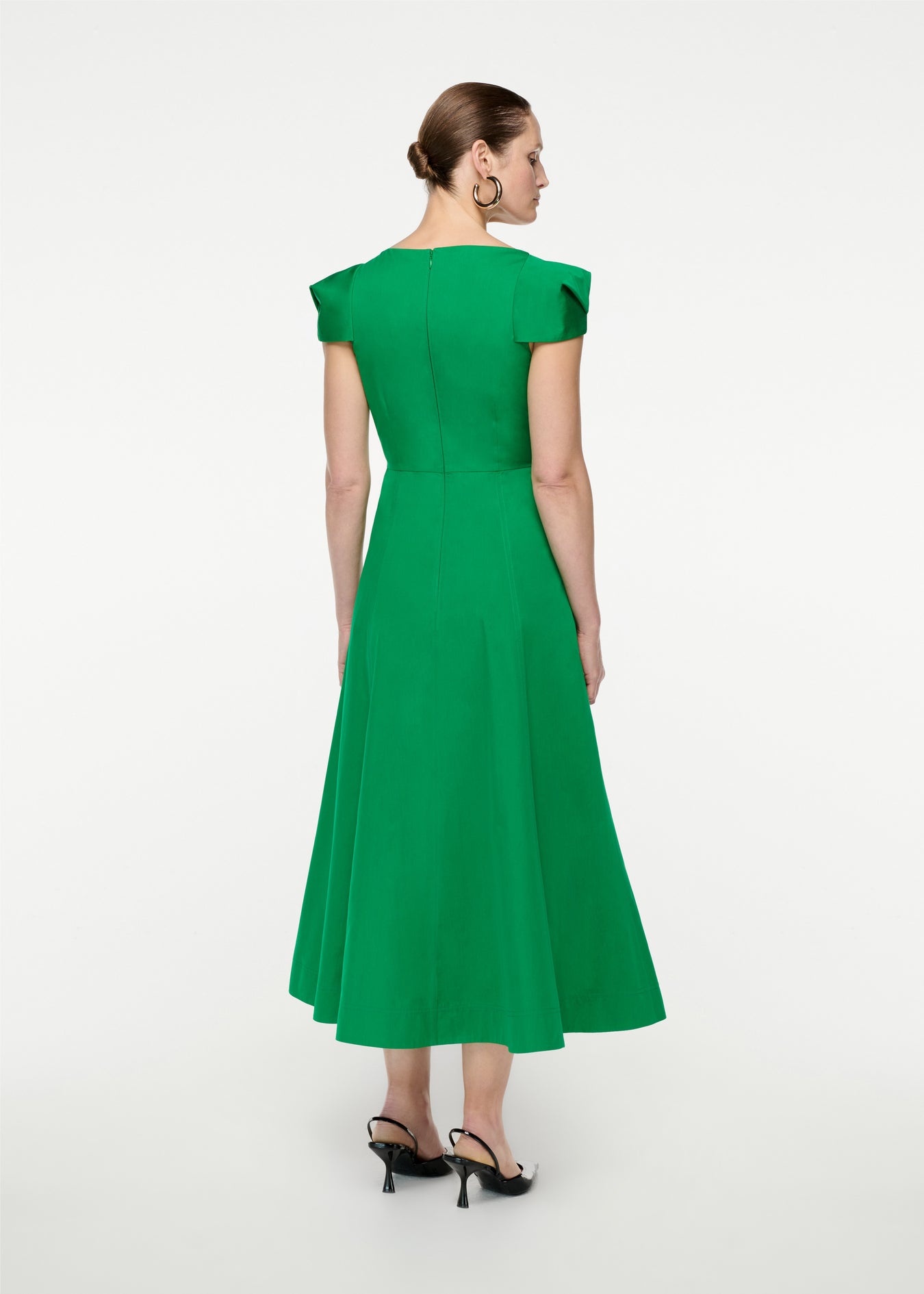 The back of a woman wearing the Cap Sleeve Cotton Poplin Midi Dress in Green