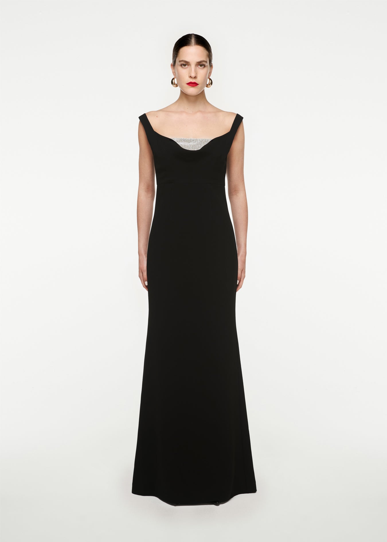 Woman wearing the Off Shoulder Cady Diamante Gown in Black