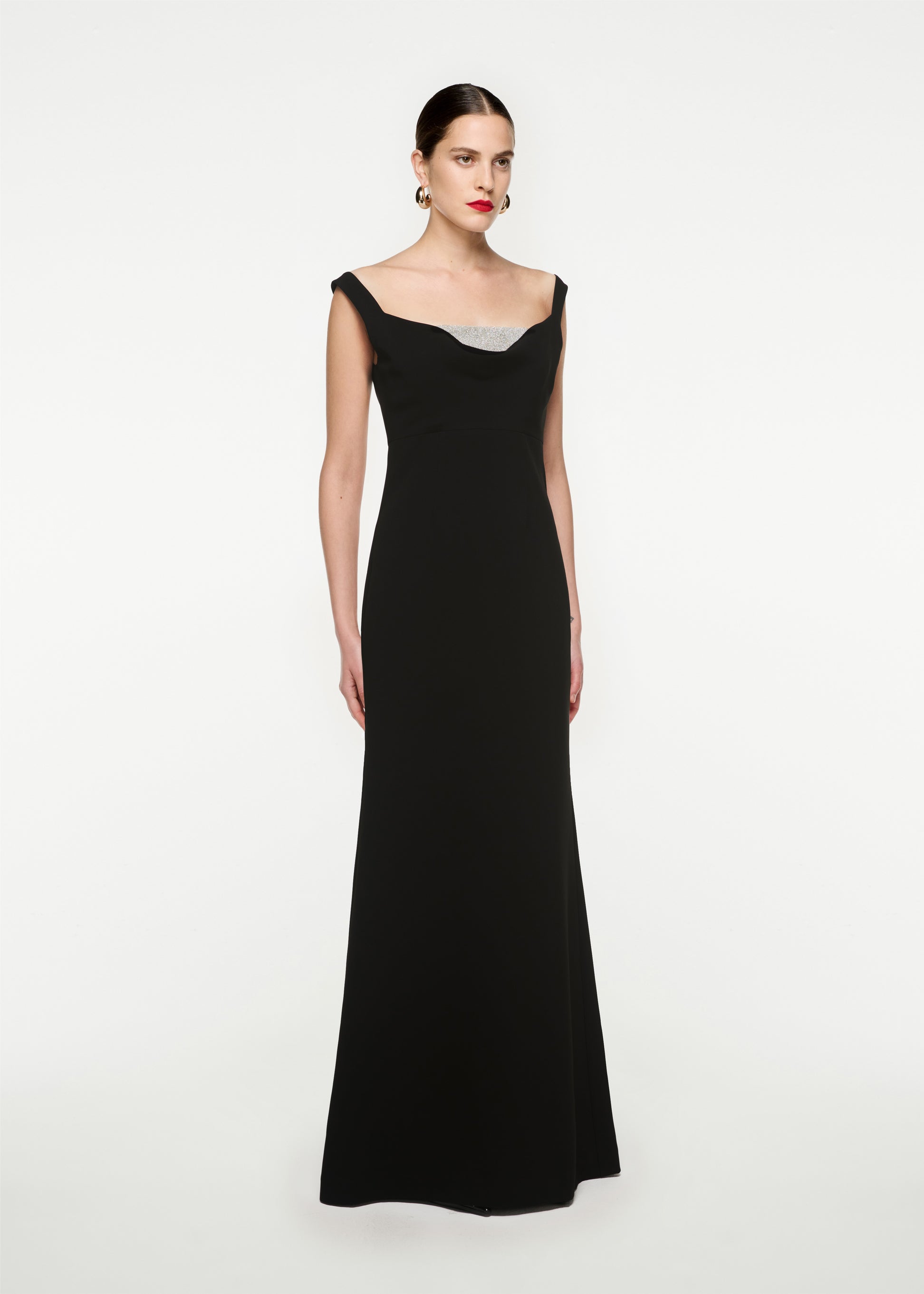 Woman wearing the Off Shoulder Cady Diamante Gown in Black