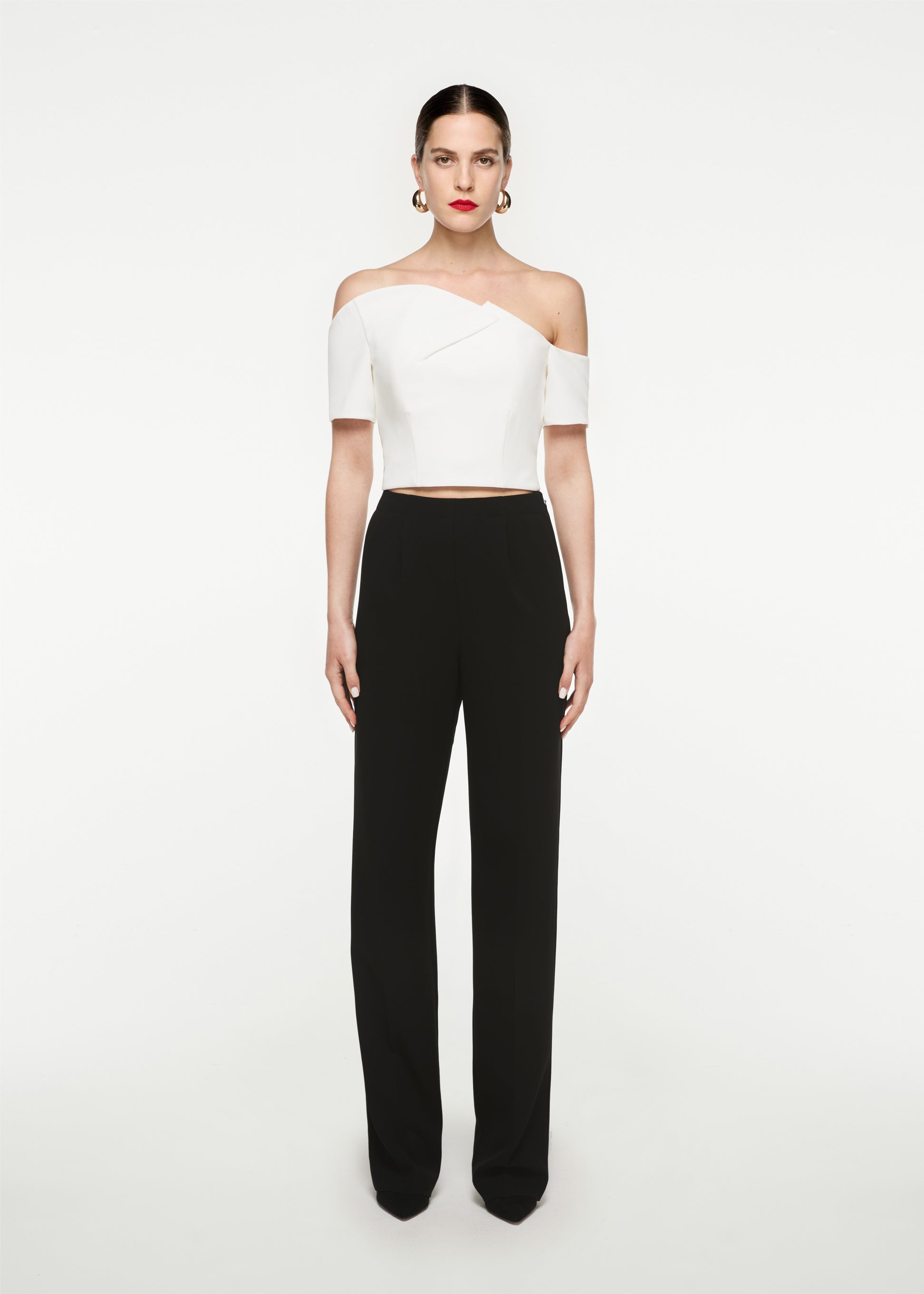 Woman wearing the Asymmetric Stretch Cady Top White in White