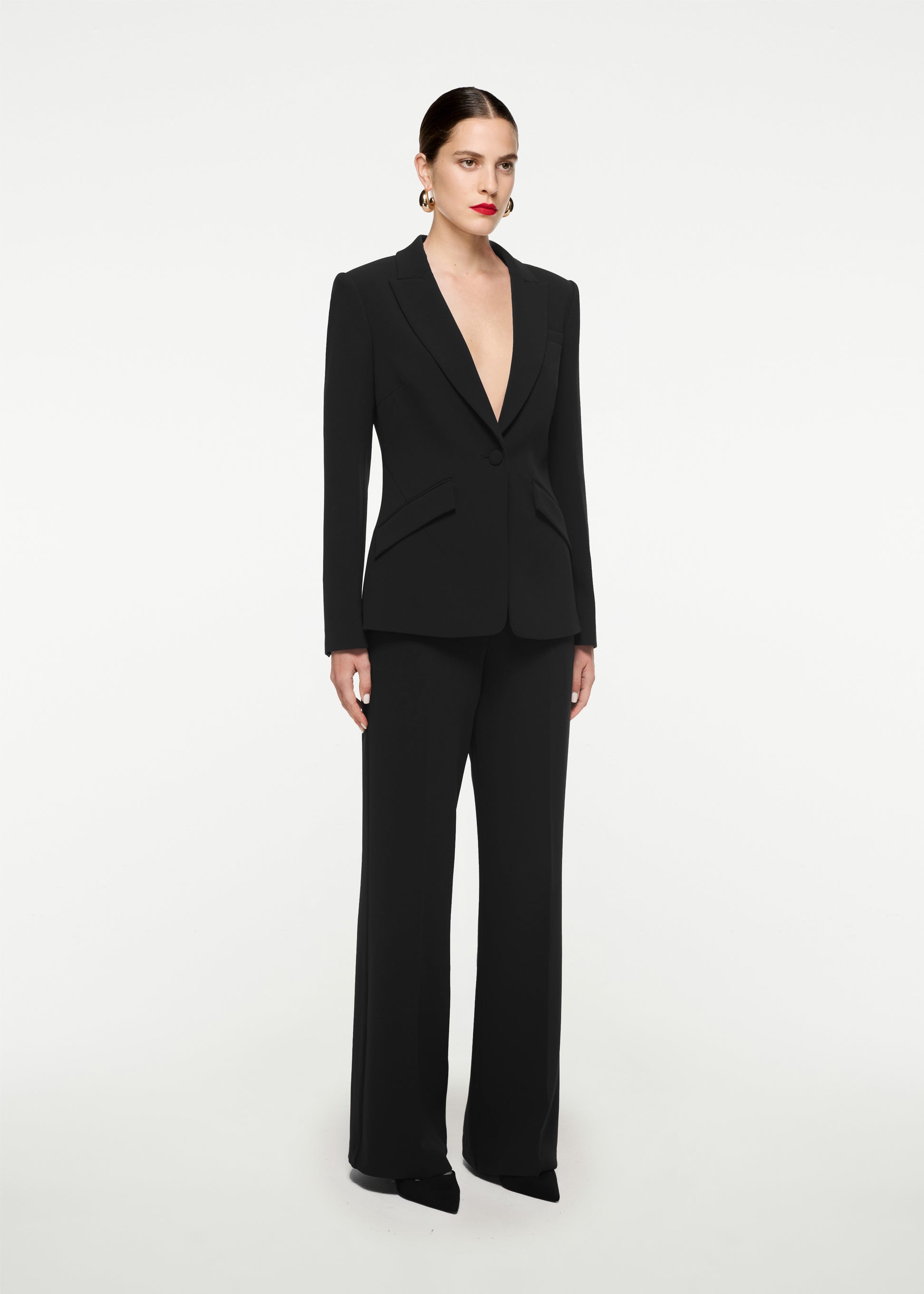 Woman wearing the Single Breasted Stretch Cady Blazer in Black