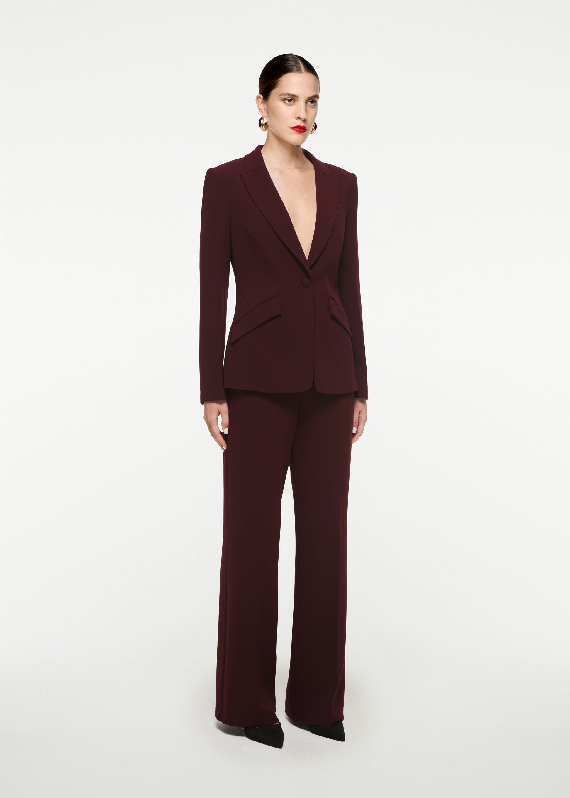 Woman wearing the Single Breasted Stretch Cady Blazer in Maroon