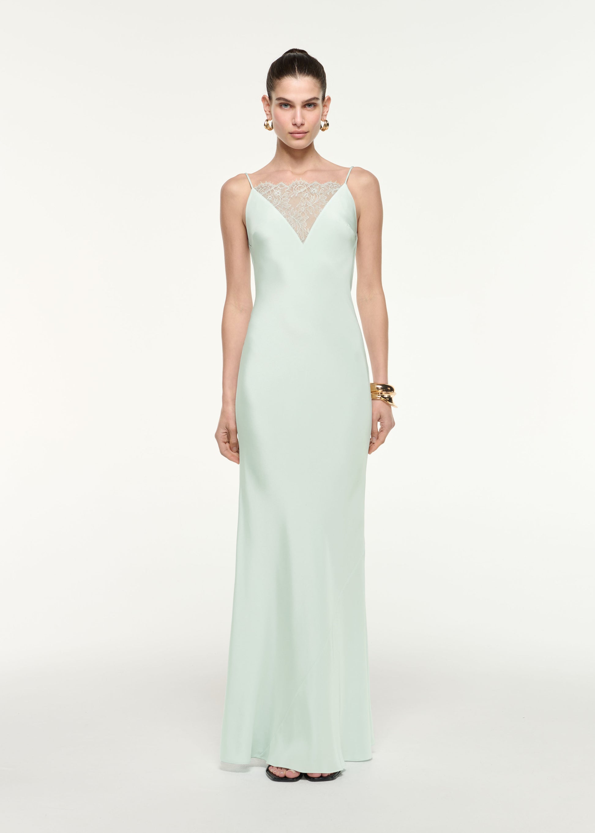 Front view of a model wearing the Silk Lace Gown in Mint