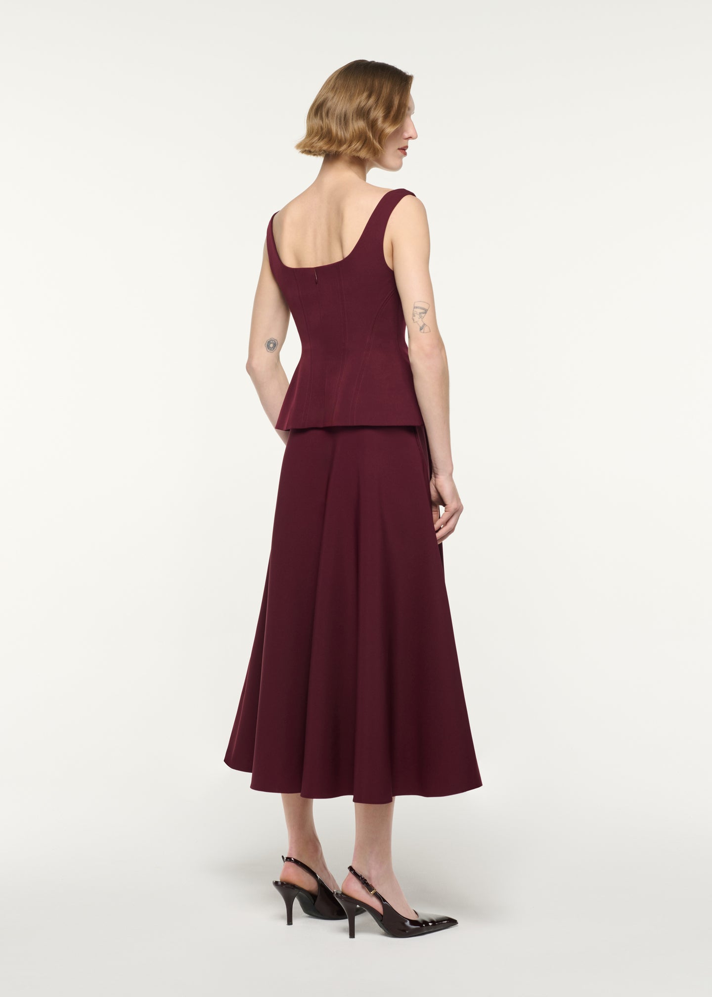 Crepe Peplum Midi Dress