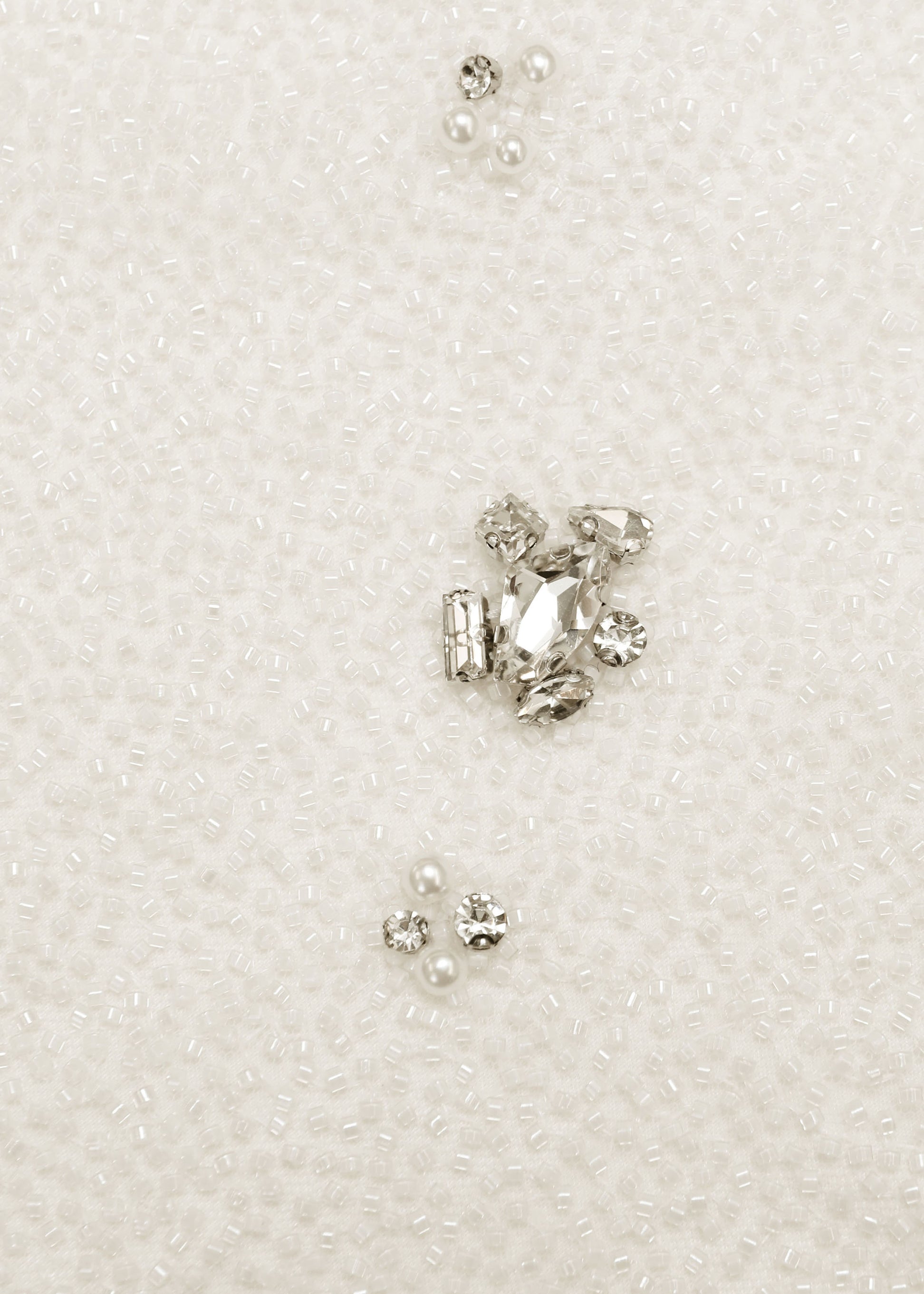 A close up of the fabric for the V-Neck Beaded Slip Dress