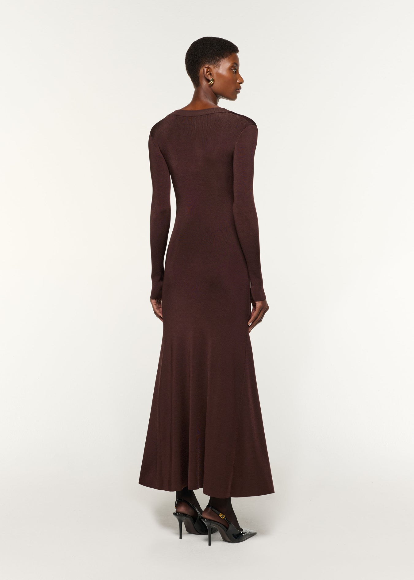 Back view of a model wearing the Scoop Neck Viscose Knit Dress in Brown