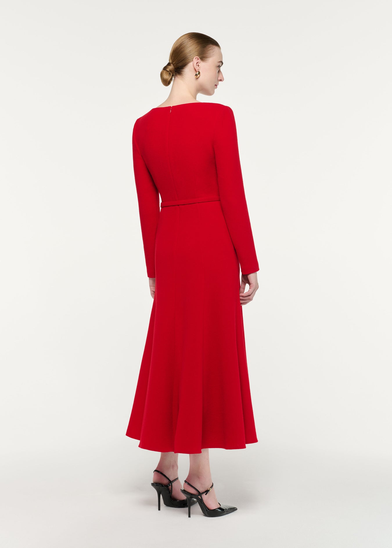 Back view of a model wearing the Boat Neck Wool Crepe Dress