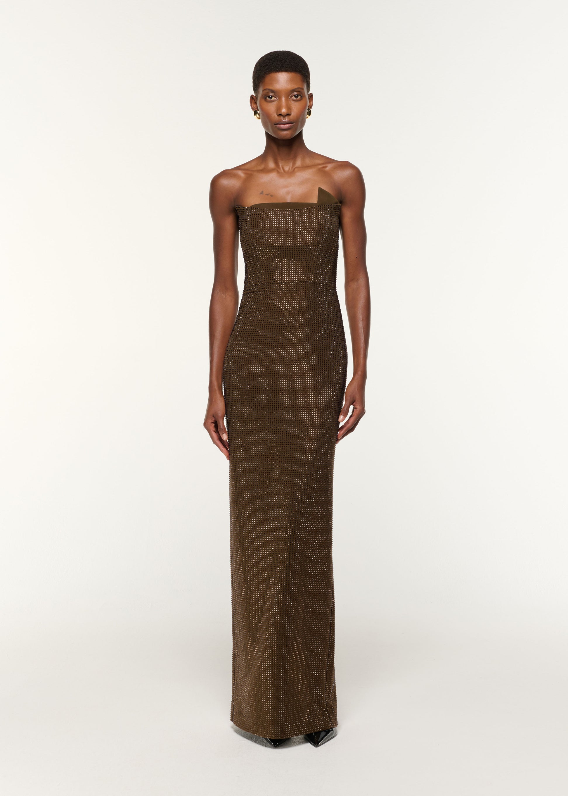 Front view of a model wearing the Strapless Diamante Gown in Khaki