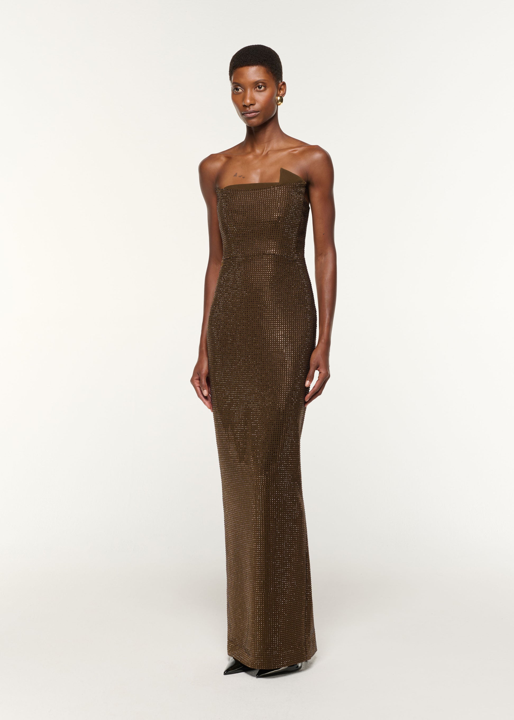 Side view of a model wearing the Strapless Diamante Gown in Khaki