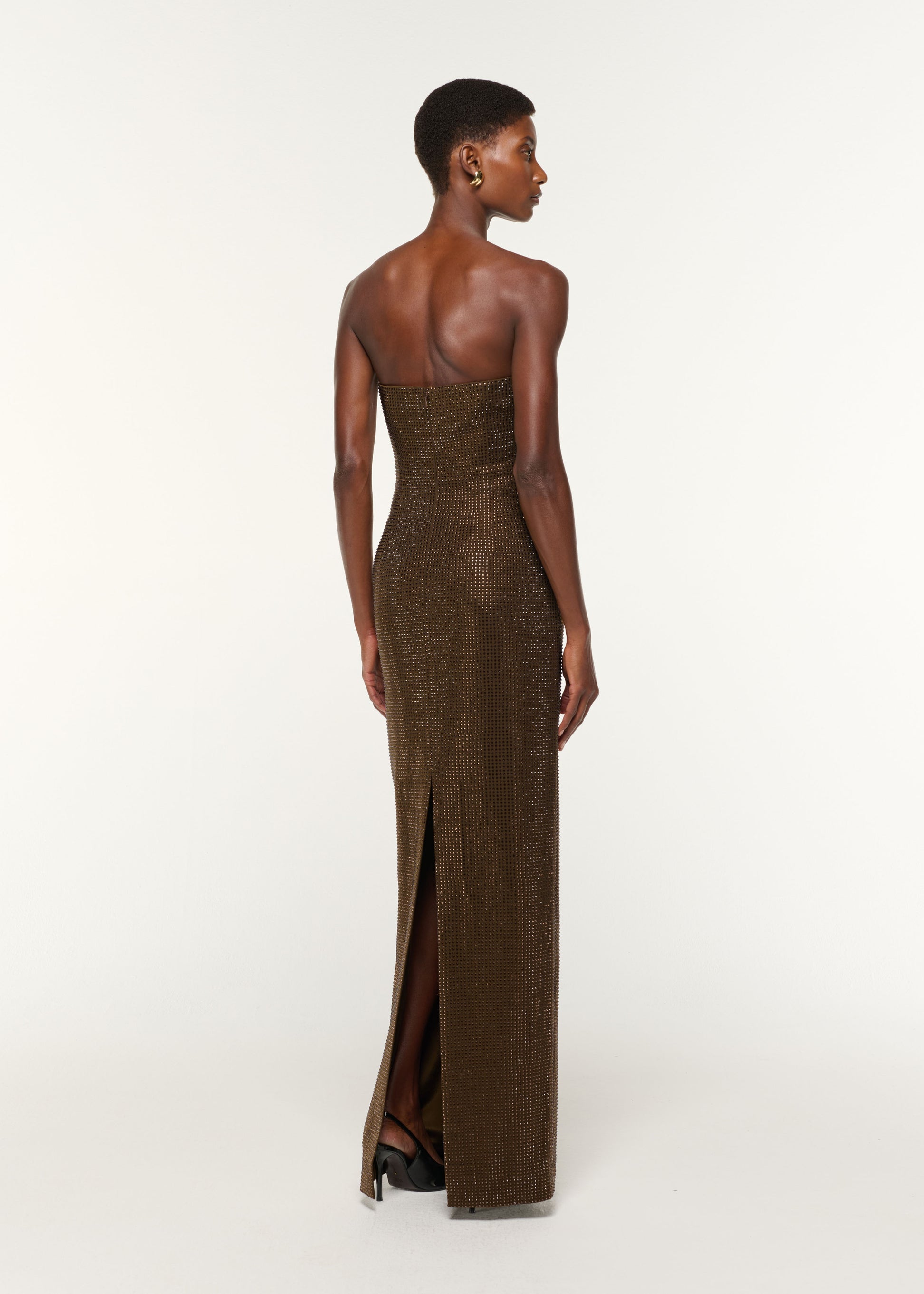 Back view of a model wearing the Strapless Diamante Gown in Khaki