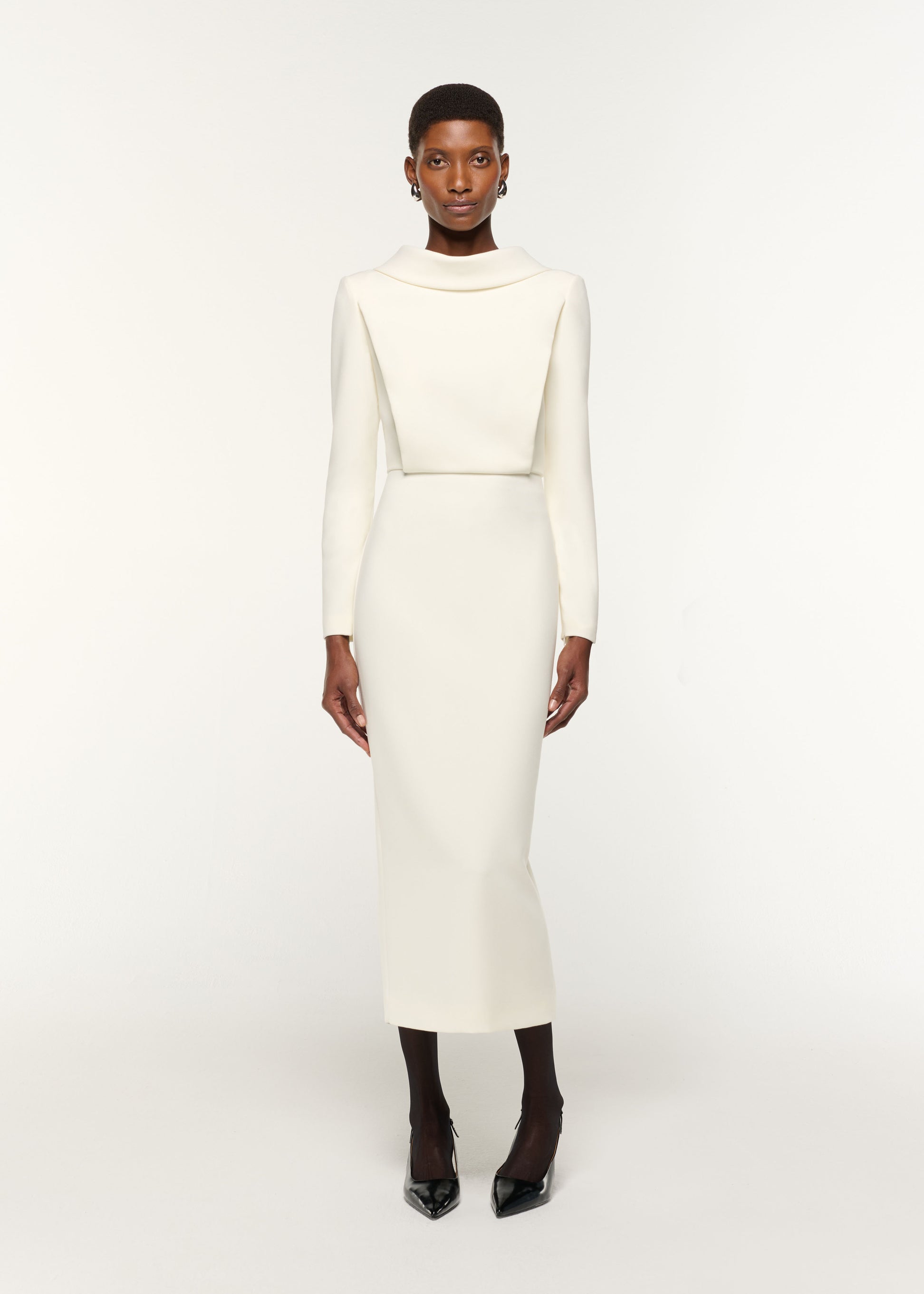 Front view of a model wearing the Collared Crepe Midi Dress in Cream