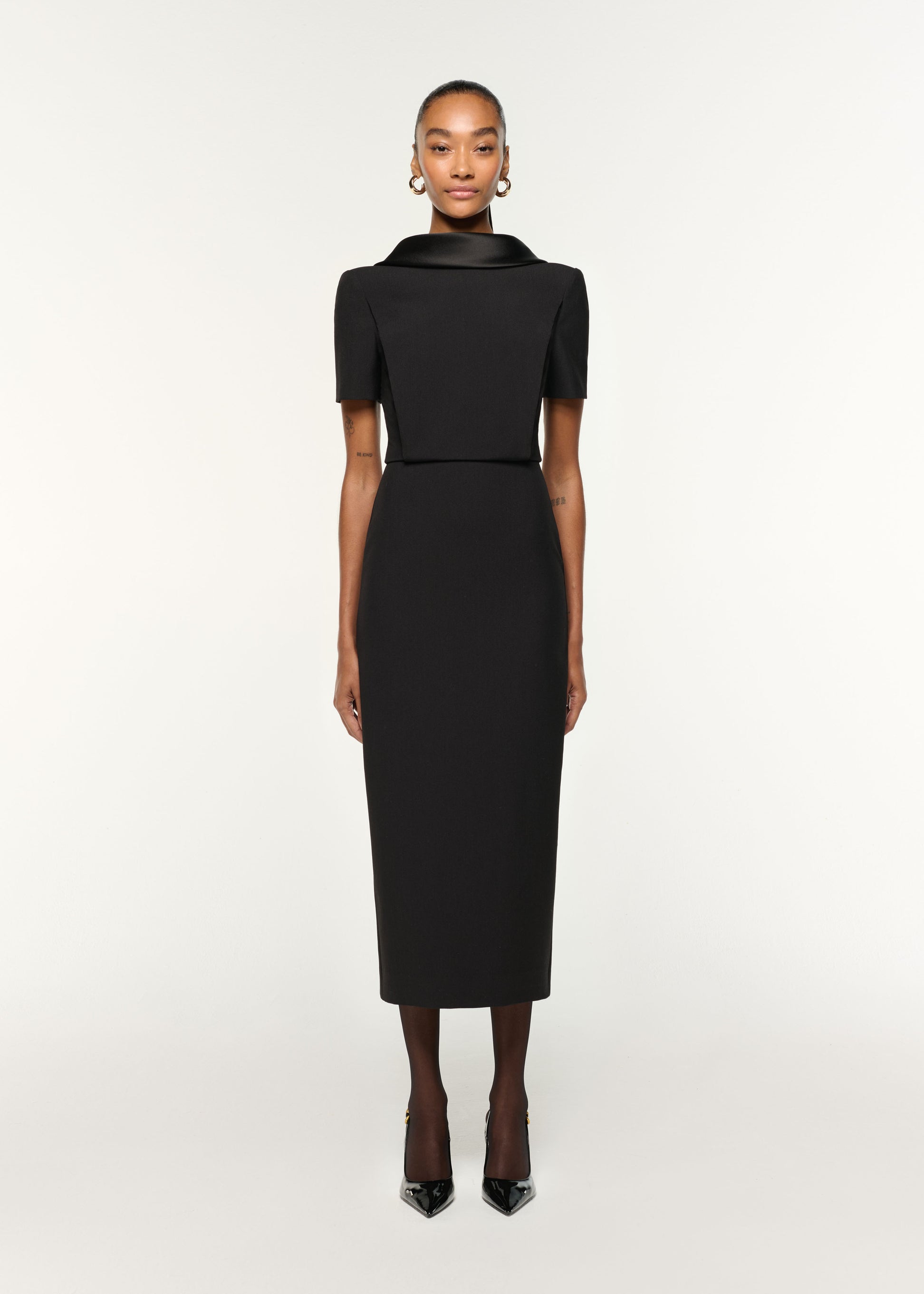 Front view of a model wearing the Collared Crepe Midi Dress in Black