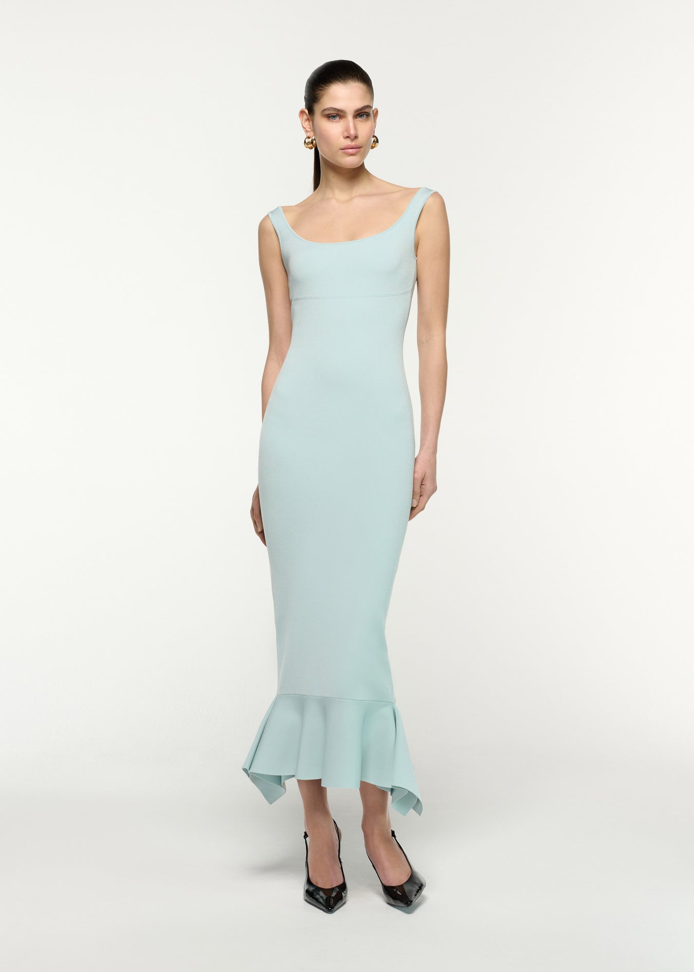 Front view of a model wearing the Fit And Flare Knit Midi Dress in Aqua 