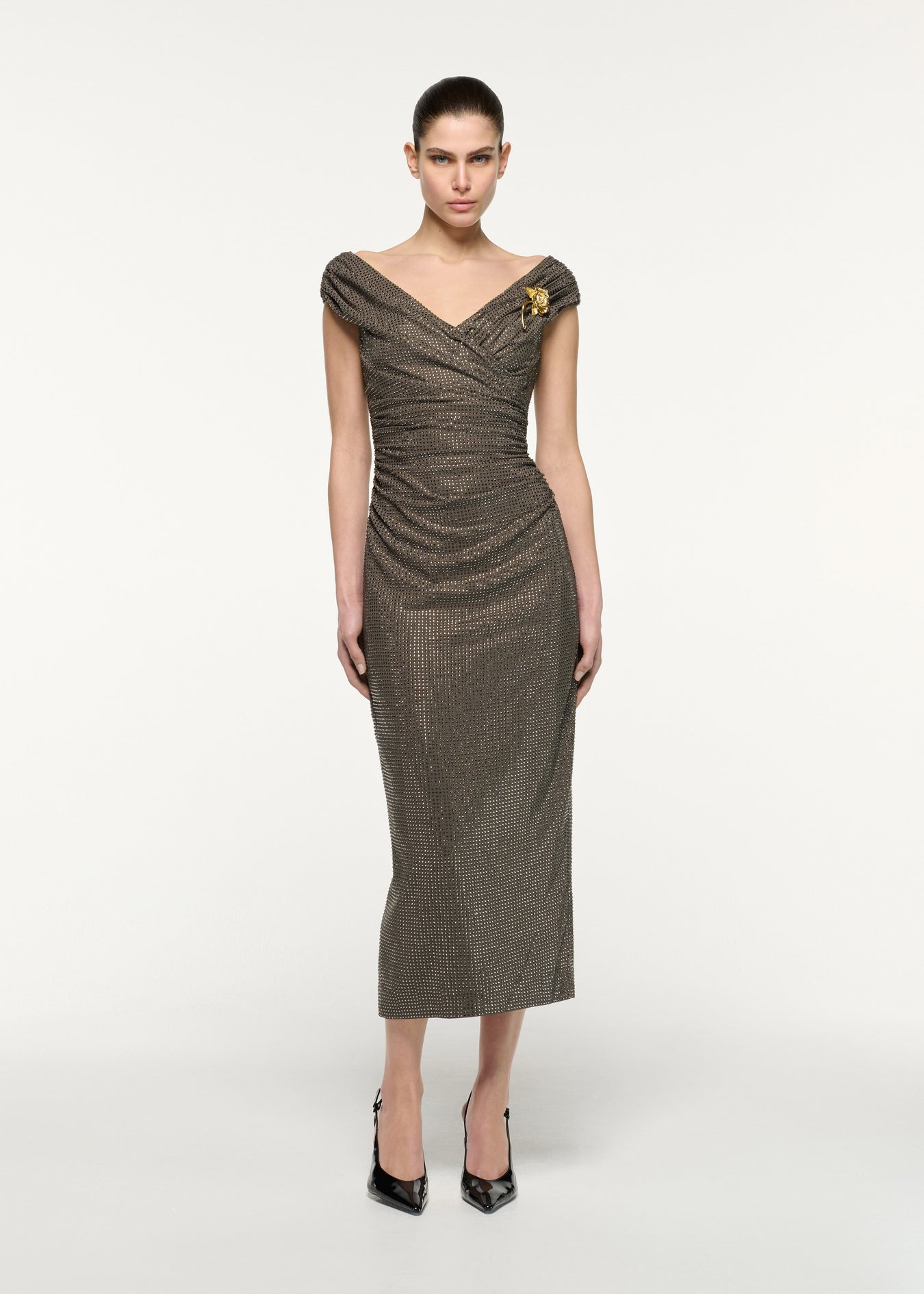 Front view of a model wearing the Gold Rose Brooched Diamante Midi Dress in Taupe