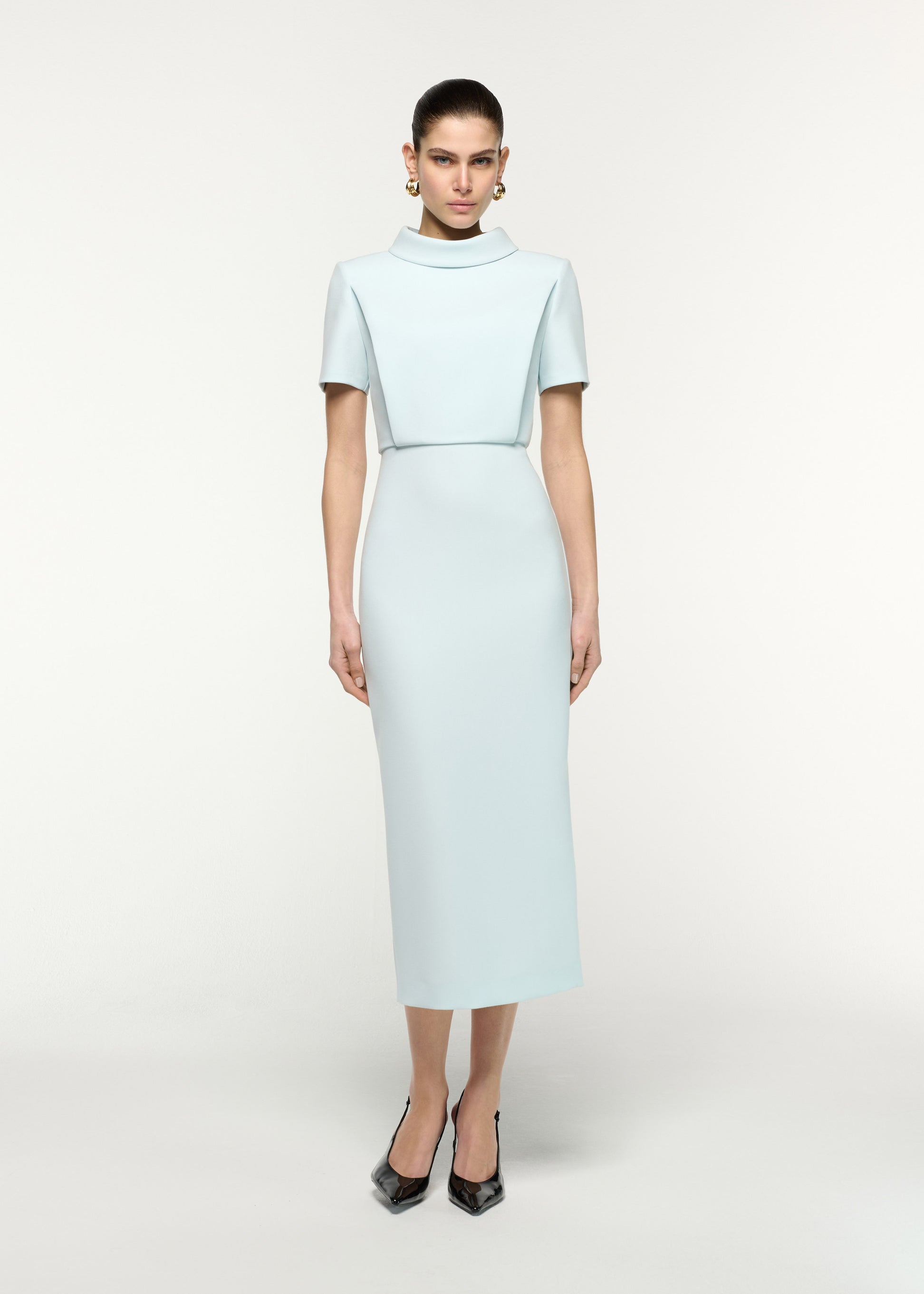 Front view of a model wearing the Collared Crepe Column Midi Dress in Aqua
