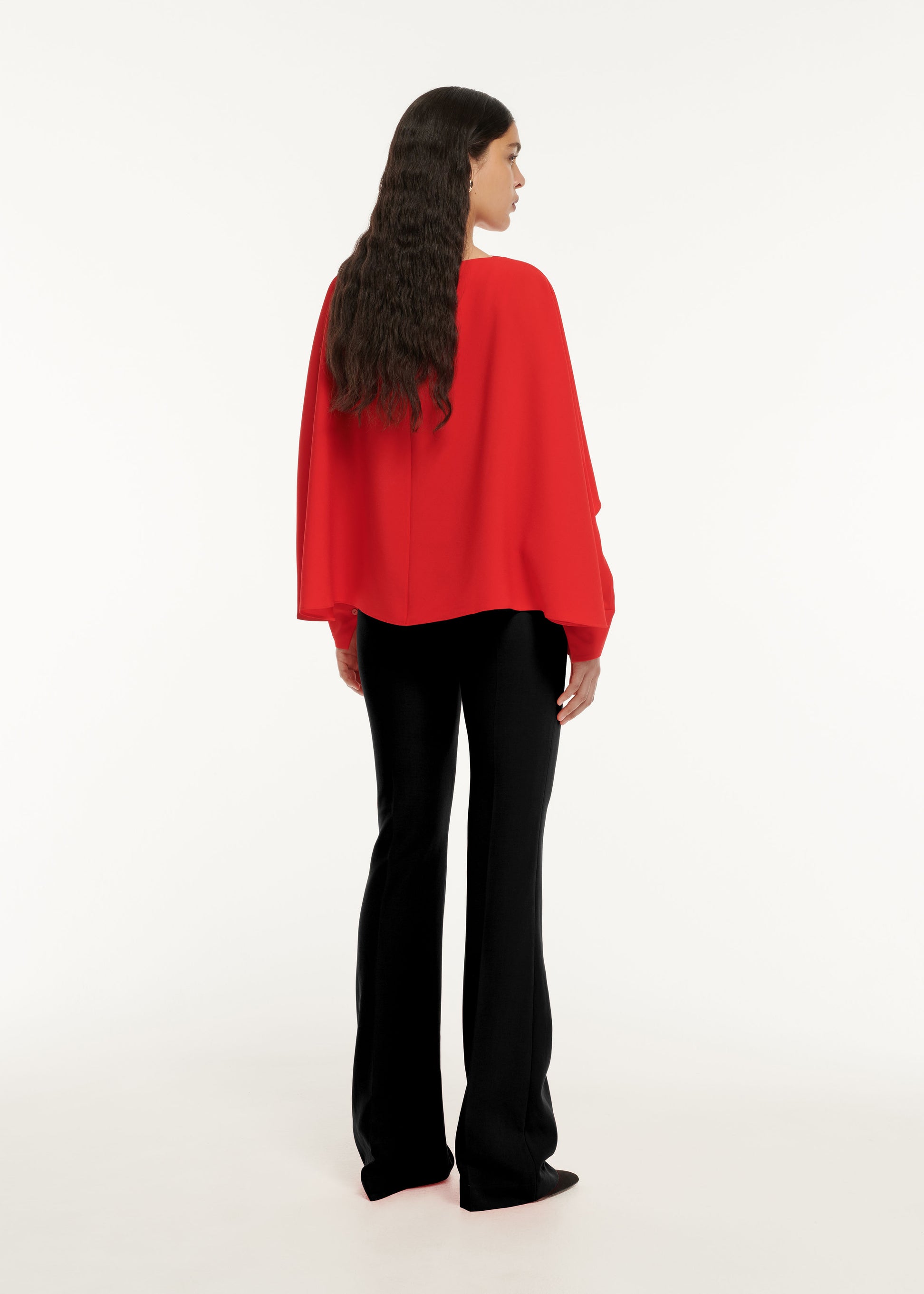 The back of a woman wearing the Stretch Cady Midi Dress Red