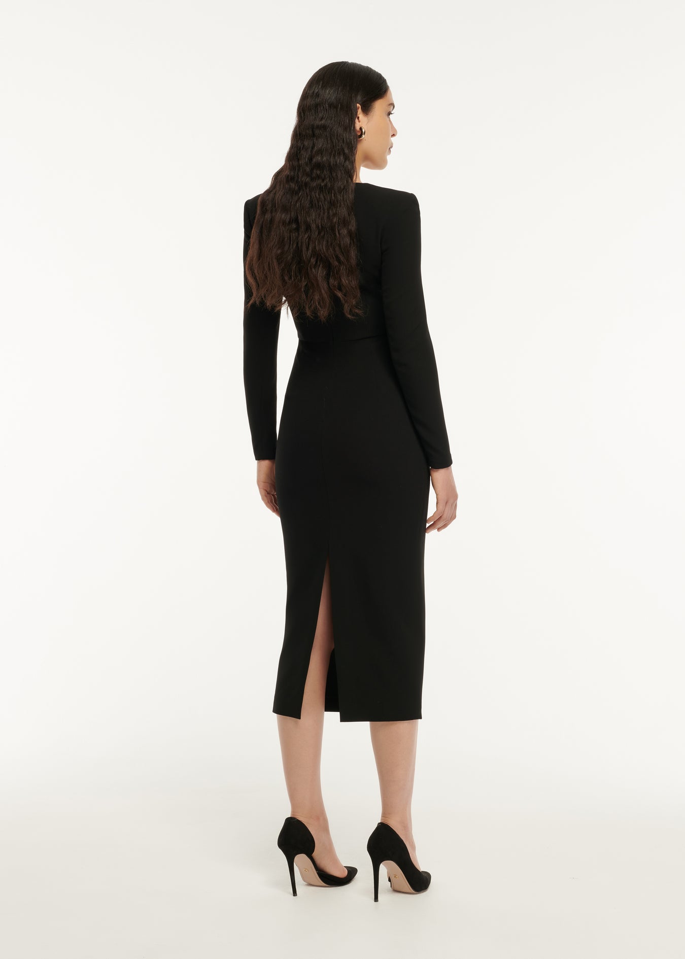 The back of a woman wearing the Long Sleeve Curved Stretch Cady Midi Dress
