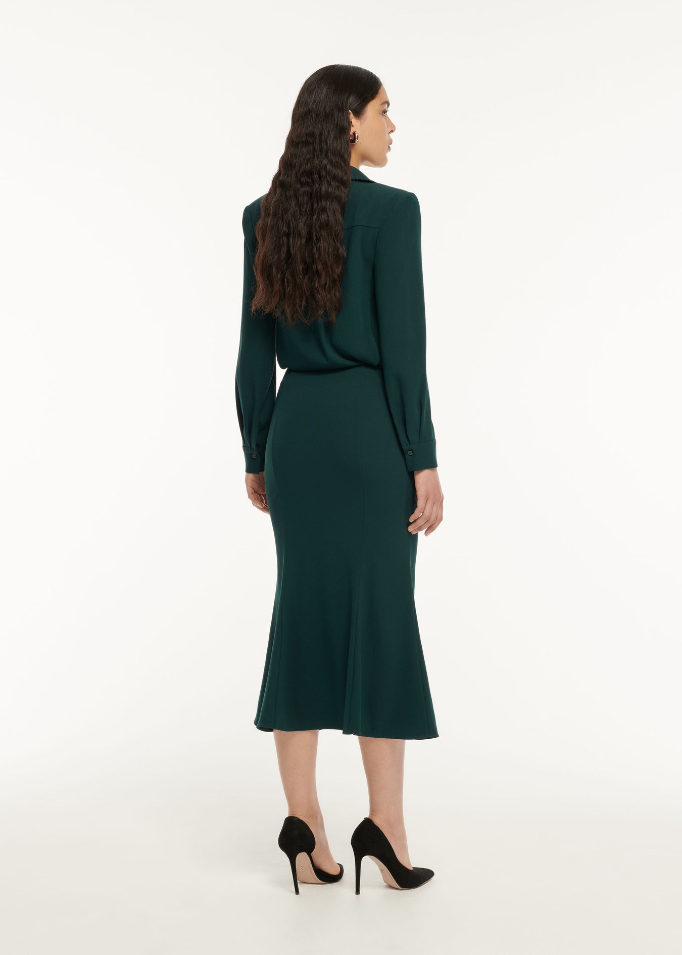 The back of a woman wearing the Long Sleeve Crepe Midi Dress